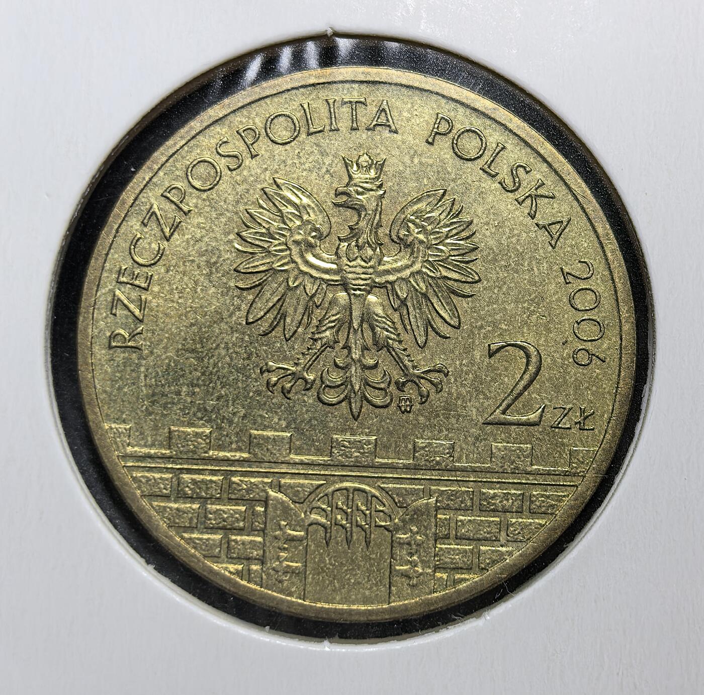 外国优质老铜币银币苏联纪念章，每周六晚九点倒数截拍，满百包邮可寄存，持续收拍 波兰2006年2兹罗提纪念币，属第三共和国时期。正面为白鹰与城门，背面是海乌姆圣母升天大教堂，隶属于 “波兰历史名城” 系列，见证波兰文化遗产传承与战后经济社会发展。