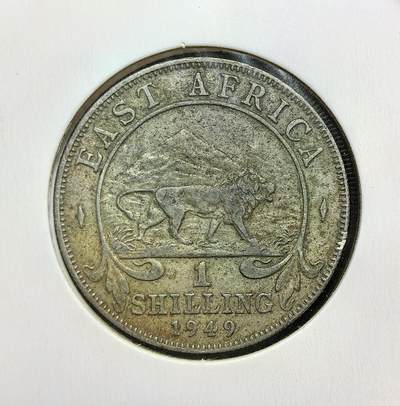 外国优质老铜币银币苏联纪念章，每周六晚九点倒数截拍，满百包邮可寄存，持续收拍 - 英属东非1949年1先令，正面为乔治六世头像，背面是象征非洲的狮子图案，见证英国殖民统治下东非的统一货币体系与殖民经济背景。