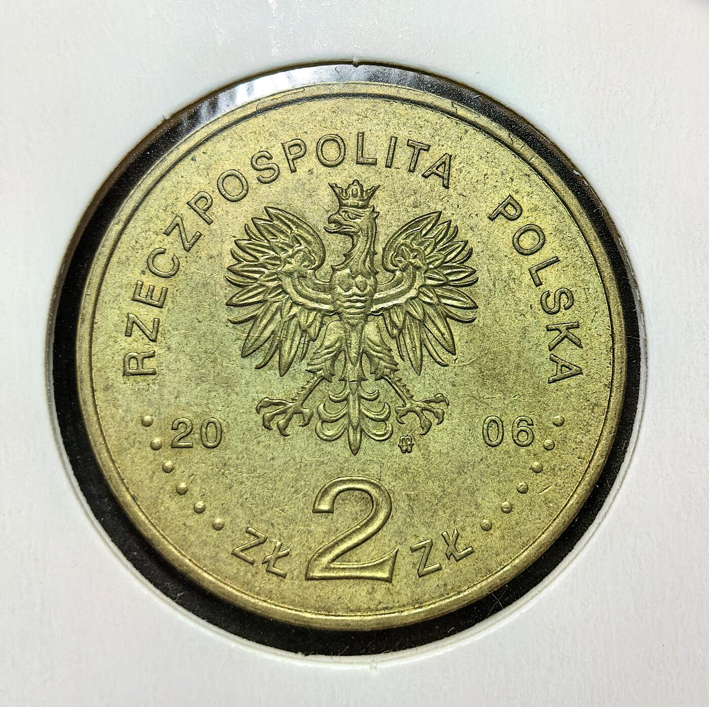 外国优质老铜币银币苏联纪念章，每周六晚九点倒数截拍，满百包邮可寄存，持续收拍 波兰2006年2兹罗提纪念币，属 “波兰历史名城” 系列。正面为波兰国徽白鹰，背面是哈乔维木制教堂，它是世界文化遗产，见证波兰传统木构建筑与宗教文化的传承。