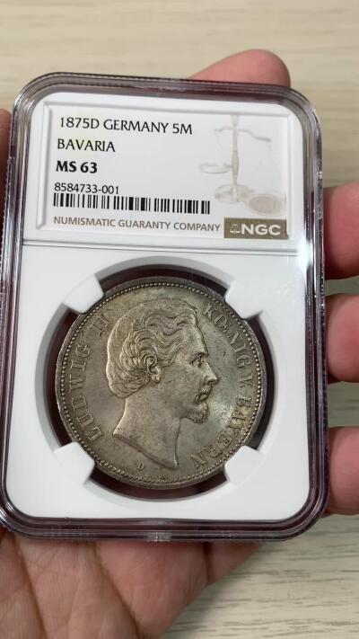万国钱币拍卖第062期 NGC MS63 1875年德国巴伐利亚路德维希二世短翅流通5马克  著名的童话国王 因流通太过充分好品难得一见 原味淡五彩转光打制极其锋利 顶级收藏品质 外拍飞涨品种