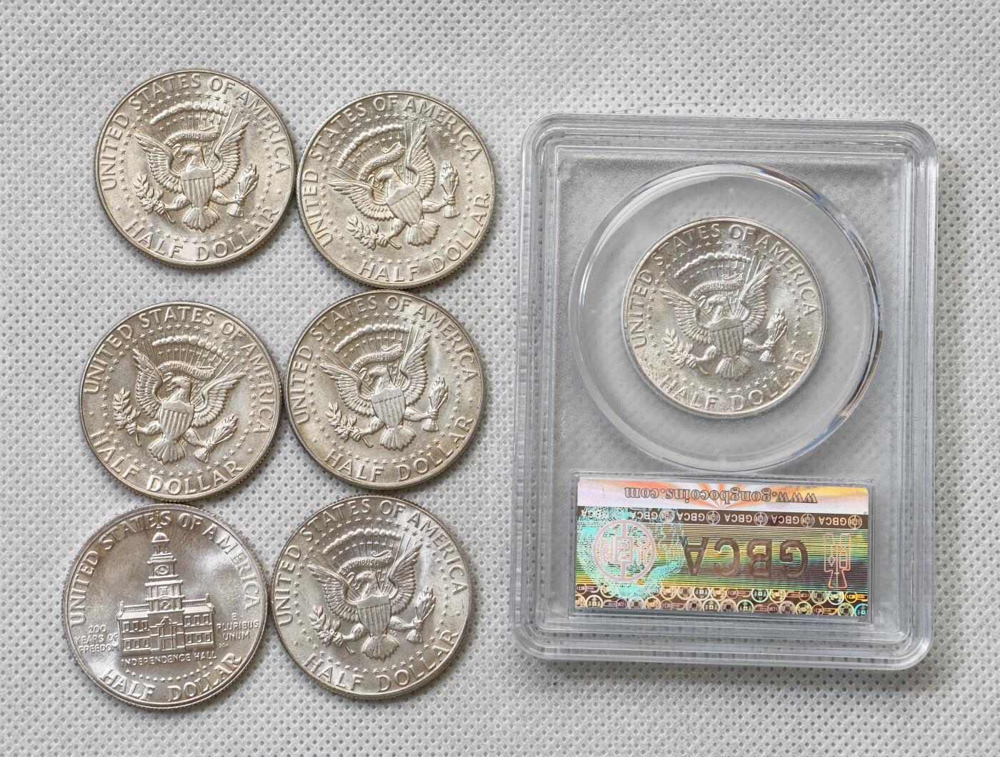 甄臻铺-世界币章拍卖（第54期），3月28日甄品场拍品征集中，送拍享返佣金等优惠多多 美国肯尼迪半圆银币一组7枚，一枚9成银，六枚4成银