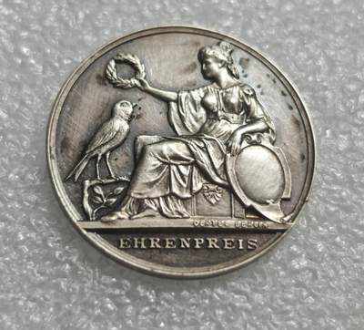 瓶子🏺第233期拍卖会 -  德国柏林金丝雀育种荣誉银章  1935–1936年   由柏林著名章牌工坊 Otto Oertel 铸造的金丝雀育种荣誉奖章，属于魏玛共和国至德三早期的德国地方宠物育种竞赛奖品
