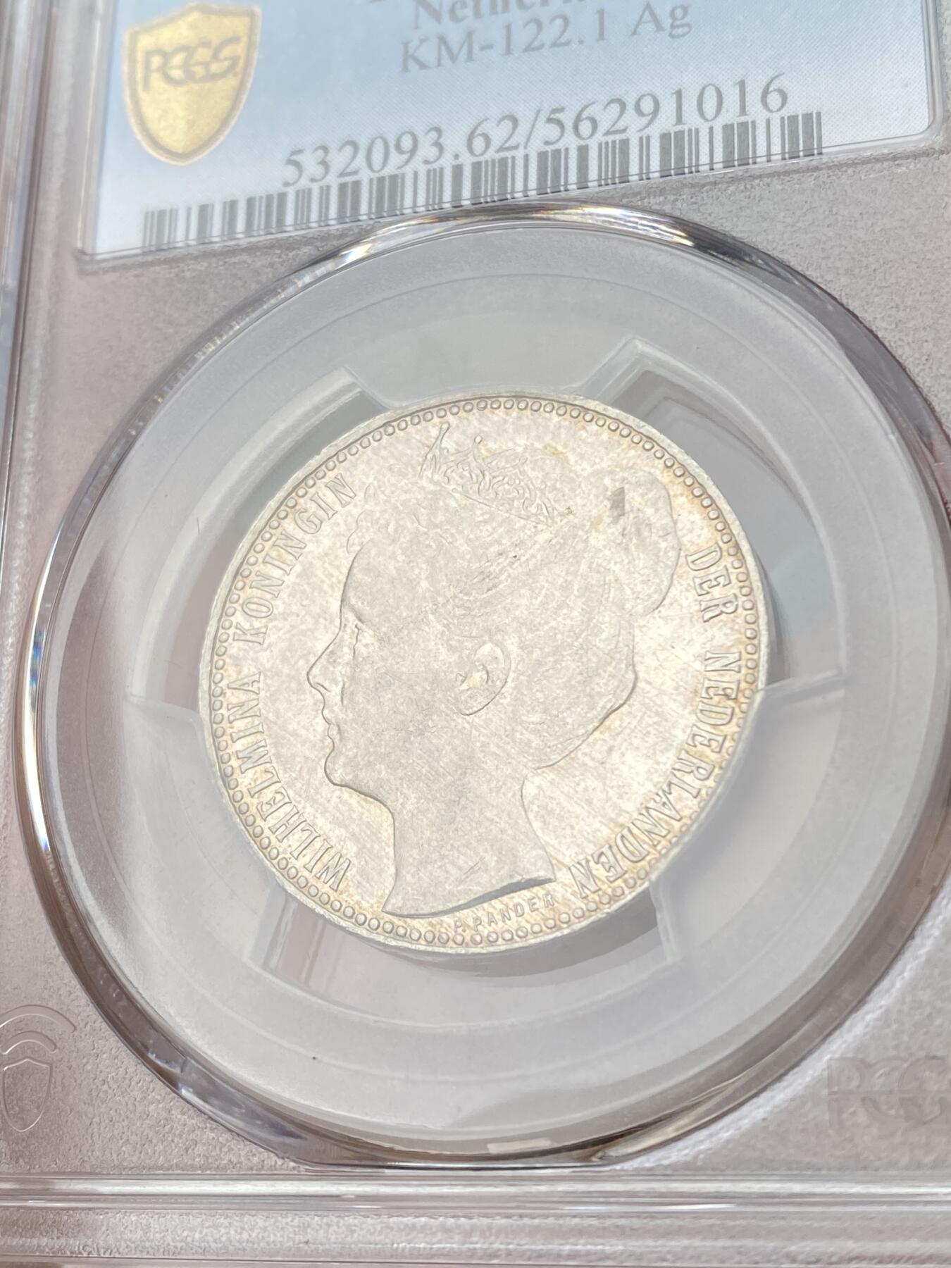 万国钱币拍卖第062期 NGC MS61 1901年荷兰王国威廉敏娜女王青年头像1盾银币 极美香槟淡彩转光 青年皇冠版好品难得一见