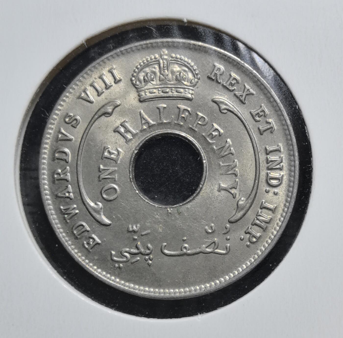 外国优质老铜币银币苏联纪念章，每周六晚九点倒数截拍，满百包邮可寄存，持续收拍 极美品带光英属西非1936年爱德华八世半便士H版，为英国殖民时期货币。因爱德华八世在位仅 10 个月便退位，英国本土未发行其流通币，仅海外殖民地发行，此币带中孔便于当地人串挂携带，是极具收藏价值的稀有币种。