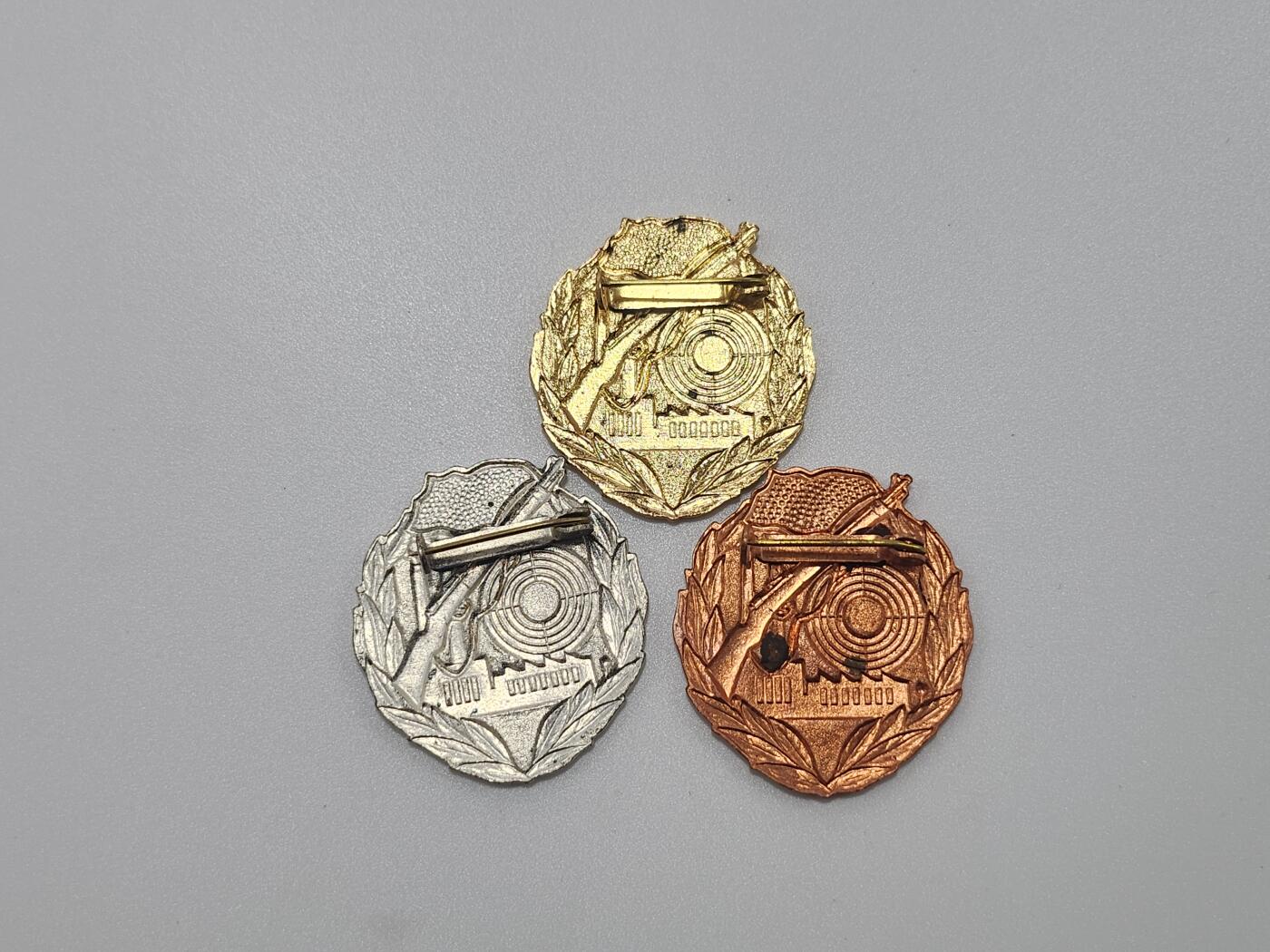 南水社第3次拍卖 春季专场 民主德国工人阶级战斗队射击技能奖章金银铜一套