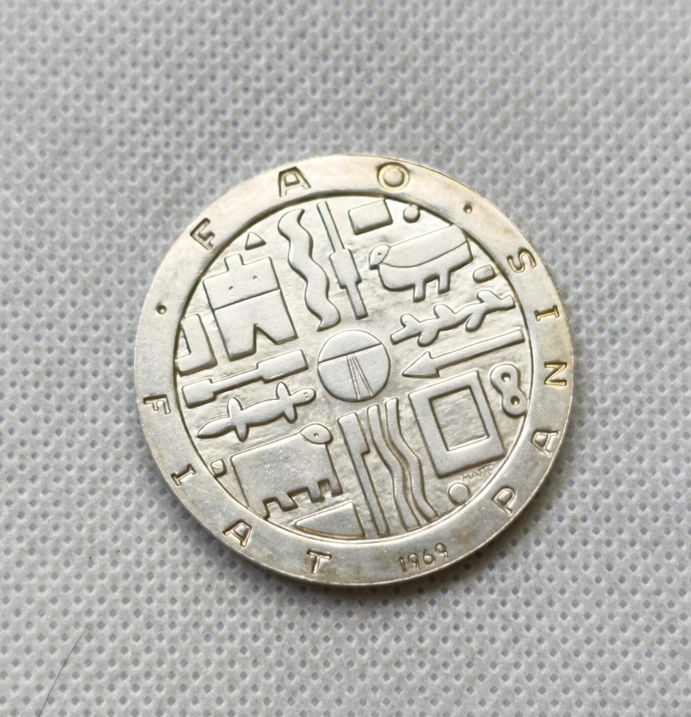 甄臻铺-世界币章拍卖（第54期），3月28日甄品场拍品征集中，送拍享返佣金等优惠多多 乌拉圭1969年联合国粮农1000比索纪念银币重25g 含银90%