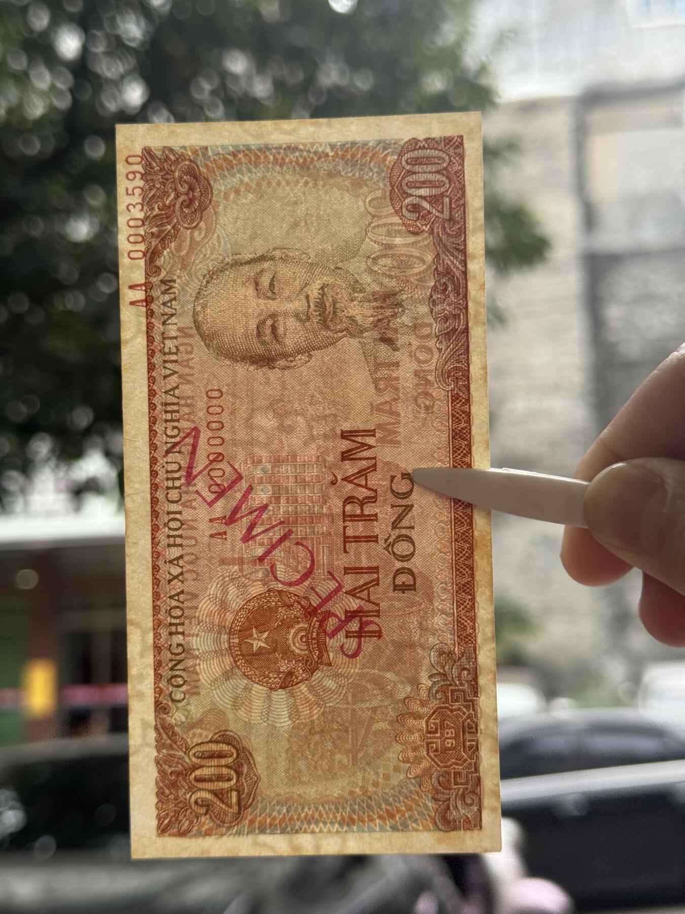 桂P钱币文化工作室拍卖第四十八期 越南1987年版200盾票样，全新UNC，有黄斑