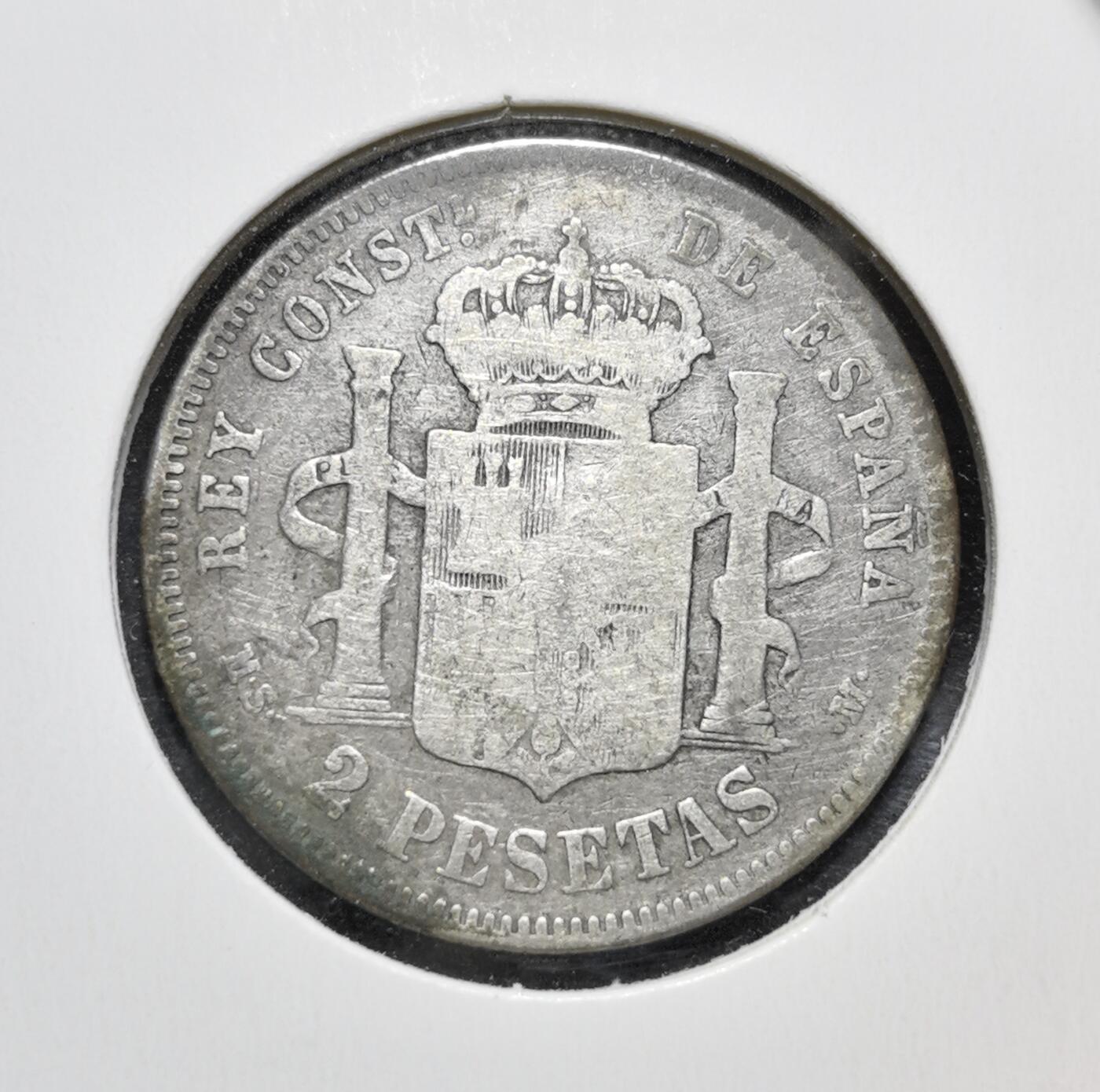 外国优质老铜币银币苏联纪念章，每周六晚九点倒数截拍，满百包邮可寄存，持续收拍 西班牙阿方索十二世1882年2比塞塔银币，由马德里造币厂铸造。正面为国王侧面像，背面是西班牙国徽与双柱图案，见证了波旁王朝复辟后的货币统一与近代化进程。