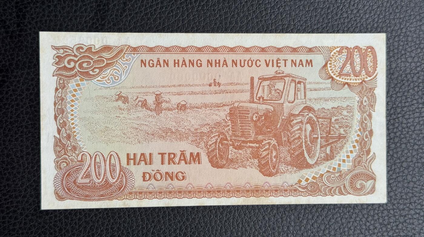 桂P钱币文化工作室拍卖第四十八期 越南1987年版200盾票样，全新UNC，有黄斑