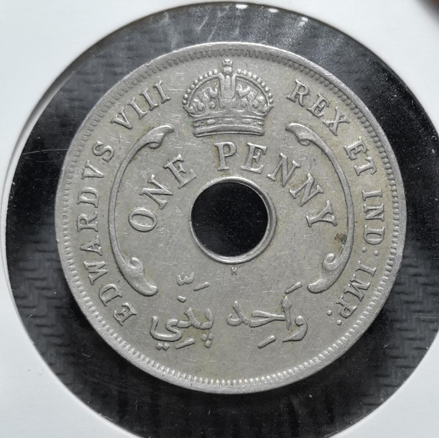 外国优质老铜币银币苏联纪念章，每周六晚九点倒数截拍，满百包邮可寄存，持续收拍 英属西非1936年1便士H版，属爱德华八世时期珍稀品。因爱德华八世退位，该币存世量稀少，中心圆孔配六芒星设计，是英国殖民货币史的特殊见证。