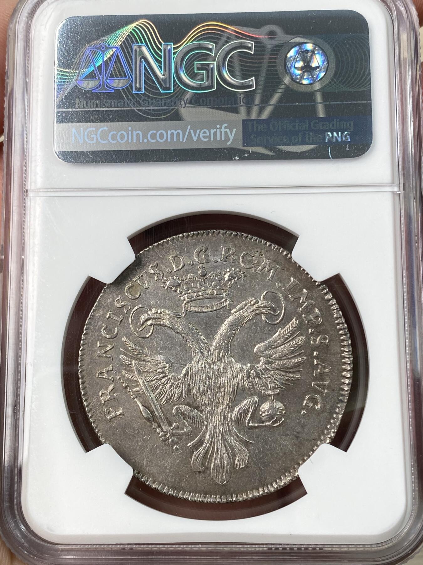 万国钱币拍卖第062期 NGC MS62 1748年德国不莱梅自由市双狮护盾1/2泰勒银币 罕见早期不莱梅双狮护钥 打制极其深峻细节纤毫毕现 淡五彩包浆环绕原味收藏级 NGC唯一冠军分