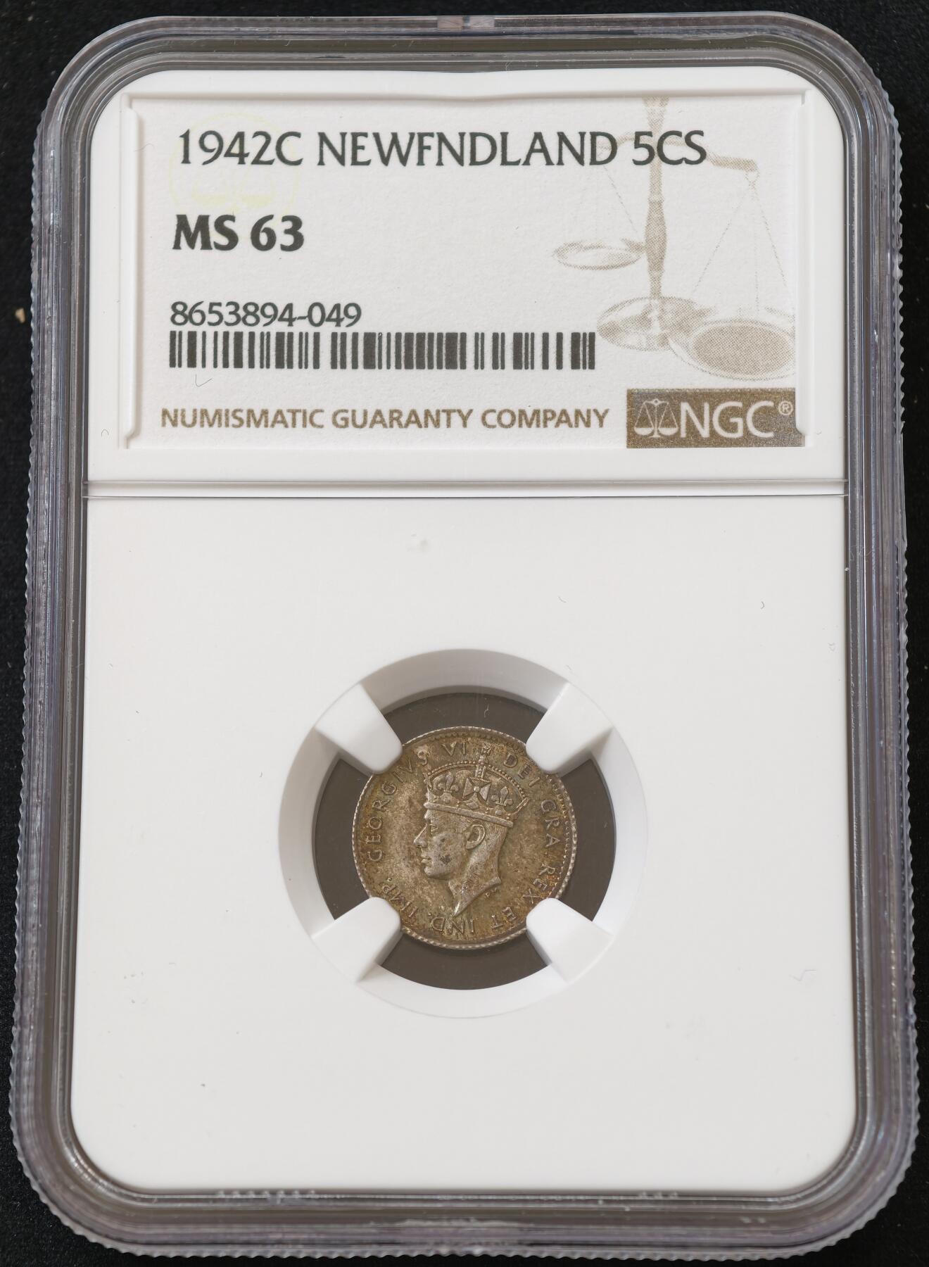 甄臻铺-世界币章拍卖（第54期），3月28日甄品场拍品征集中，送拍享返佣金等优惠多多 NGC-MS63 英属加拿大纽芬兰1942年乔治六世C版5分银币，五彩包浆，转光品相