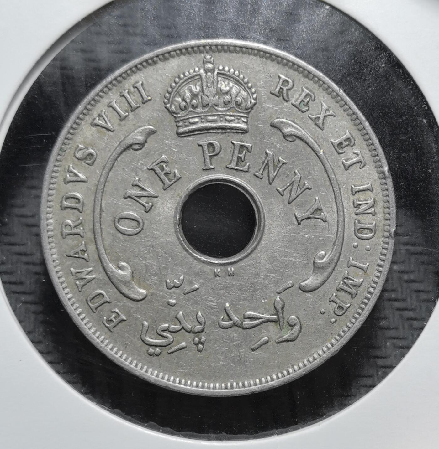 外国优质老铜币银币苏联纪念章，每周六晚九点倒数截拍，满百包邮可寄存，持续收拍 英属西非1936年1便士KN版，属爱德华八世时期珍稀品。因爱德华八世退位，该币存世量稀少，中心圆孔配六芒星设计，是英国殖民货币史的特殊见证。