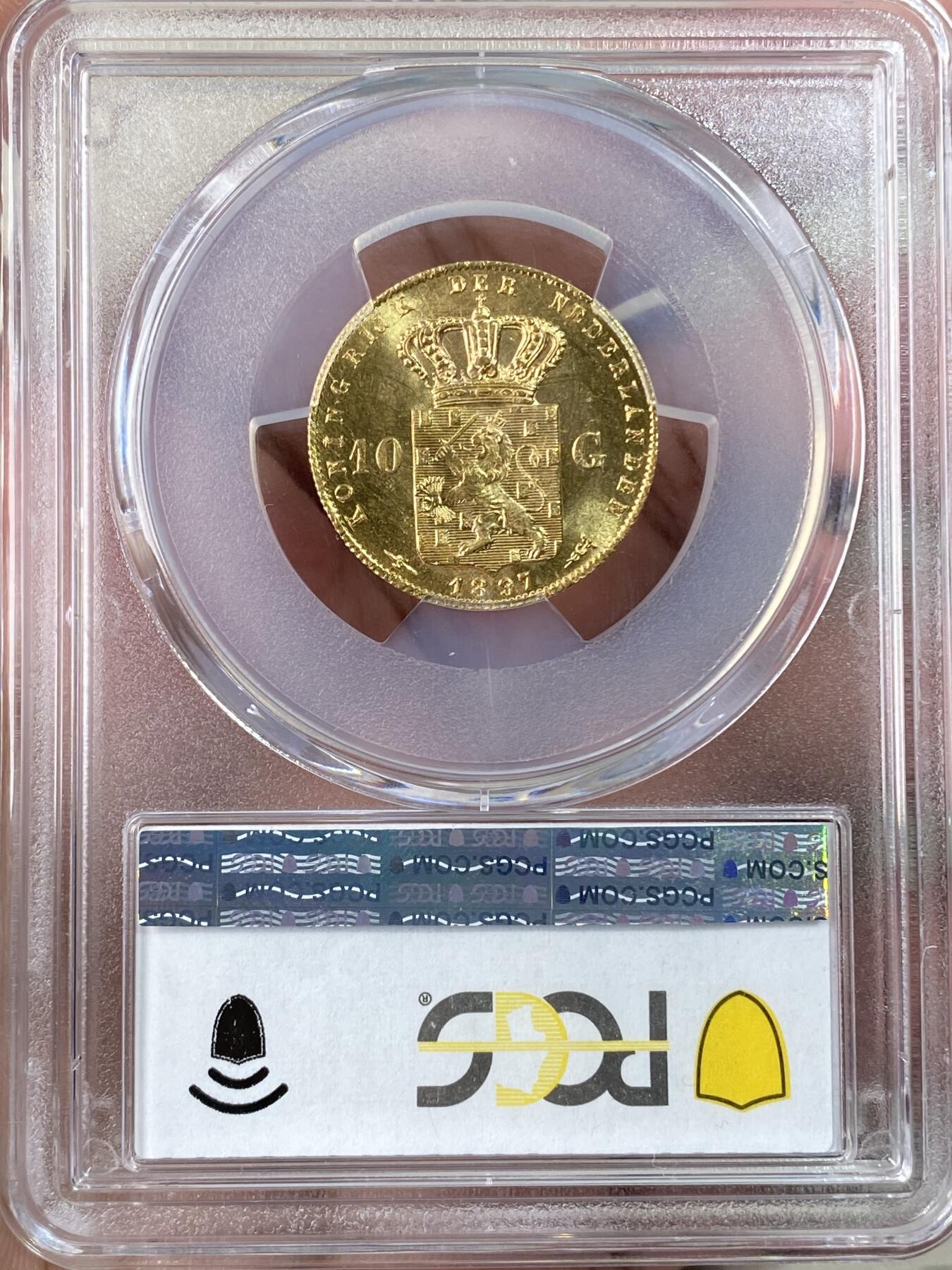 万国钱币拍卖第062期 PCGS MS65 1897年荷兰威廉明娜女王萝莉头10盾金币 发行量不到50万枚 顶级BU邮票光泽丝绸底板收藏级 6.45G 900金
