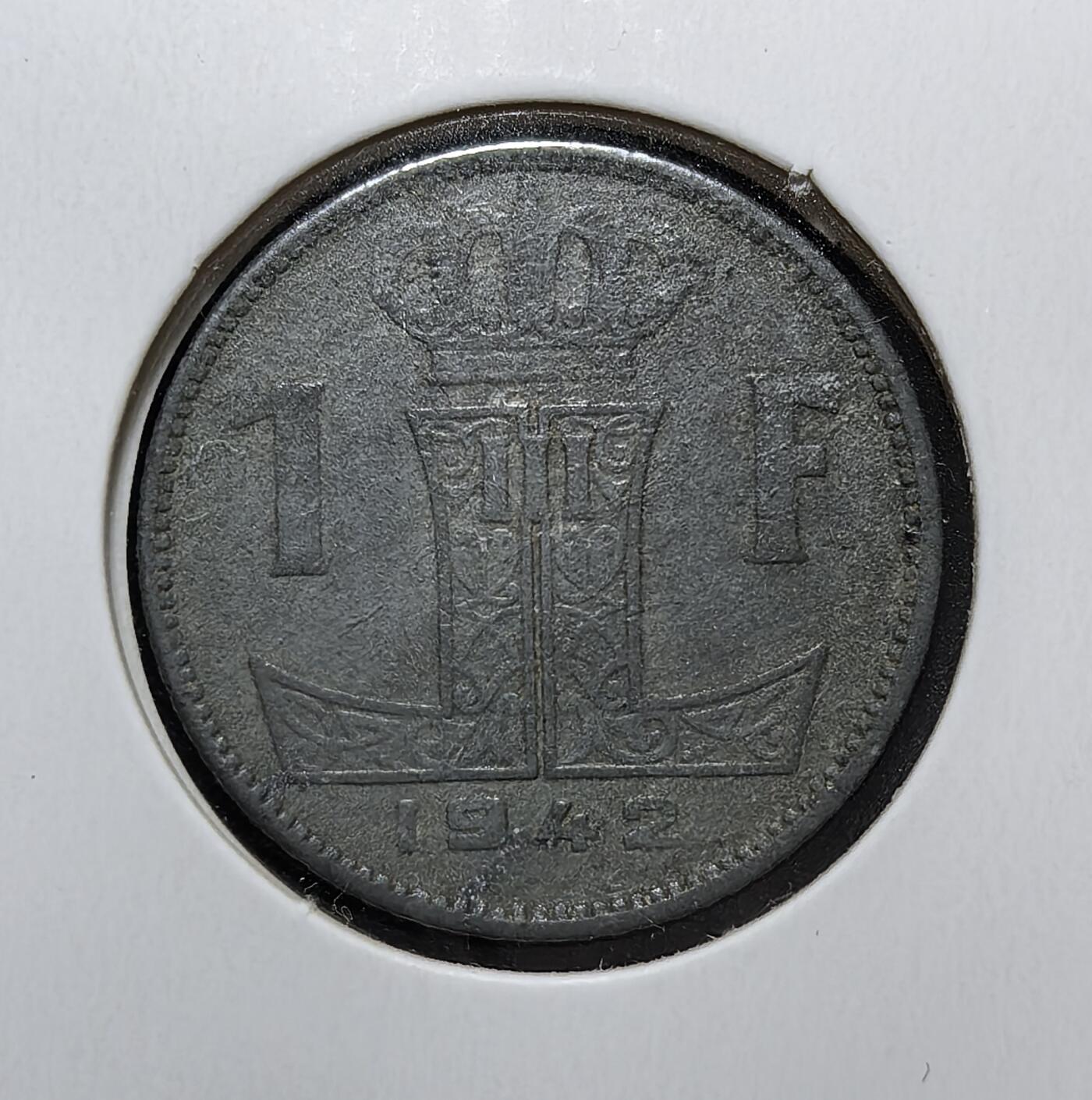 外国优质老铜币银币苏联纪念章，每周六晚九点倒数截拍，满百包邮可寄存，持续收拍 比利时1942年1法郎，是二战德国占领时期的应急发行币。因战时金属短缺，停用银币改用纯锌铸造，正面刻双语国名与比利时狮徽，背面为利奥波德三世花押与王冠，见证了比利时被占领时期的经济困境。