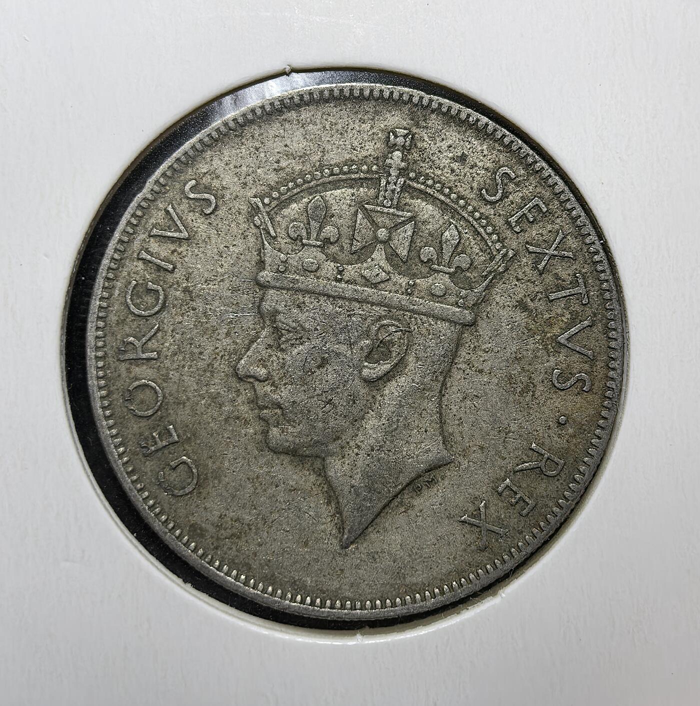 外国优质老铜币银币苏联纪念章，每周六晚九点倒数截拍，满百包邮可寄存，持续收拍 英属东非1949年1先令，正面为乔治六世头像，背面是象征非洲的狮子图案，见证英国殖民统治下东非的统一货币体系与殖民经济背景。