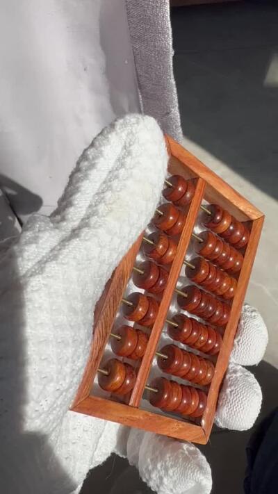 零元拍：“算盘一响，黄金万两”海南黄花梨七档小算盘。尺寸：92/60.5MM