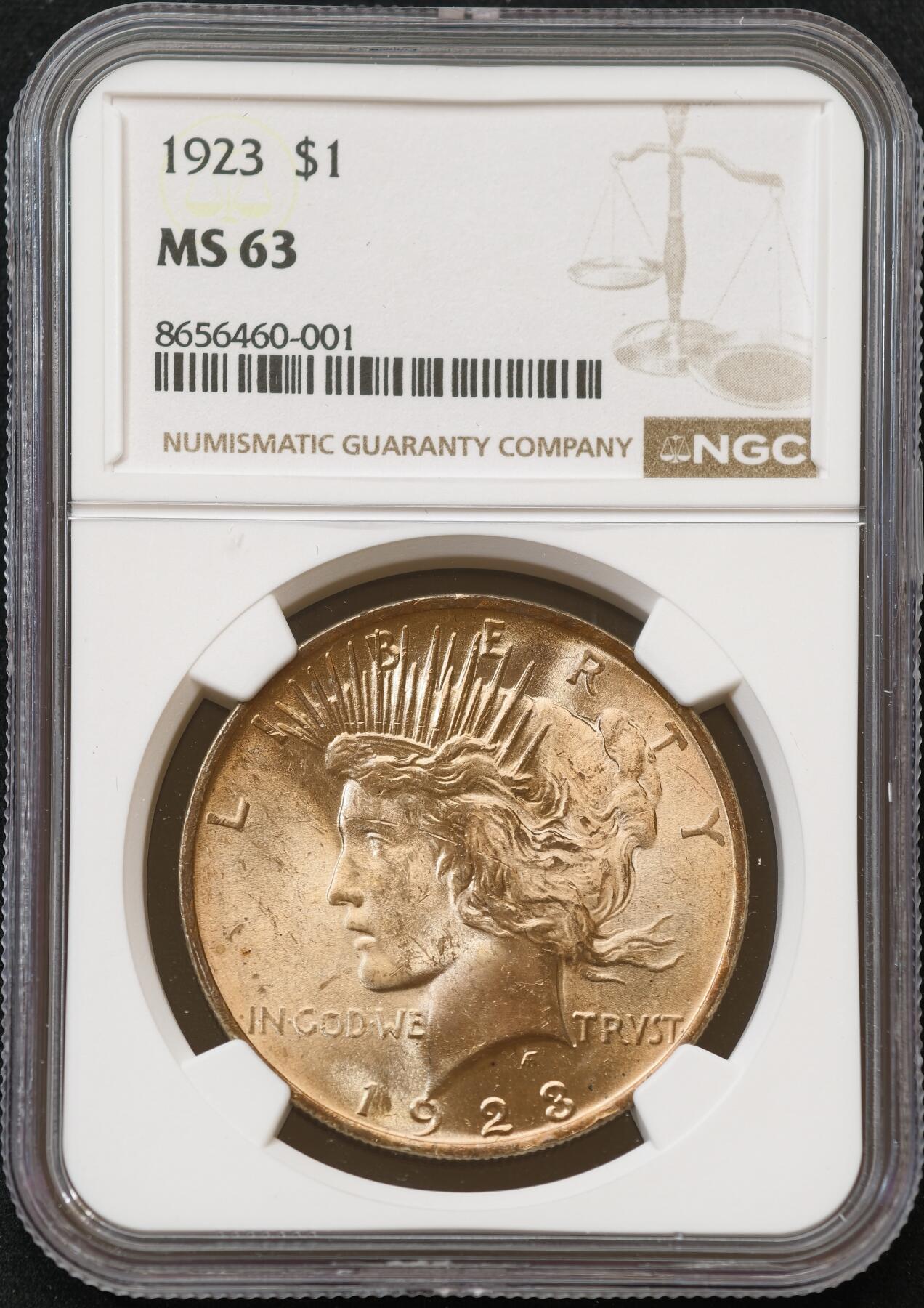 甄臻铺-世界币章拍卖（第54期），3月28日甄品场拍品征集中，送拍享返佣金等优惠多多 NGC-MS63 美国1923年和平1美元银币 暴力十字转光，带彩的不多，金黄美包浆，值得入手