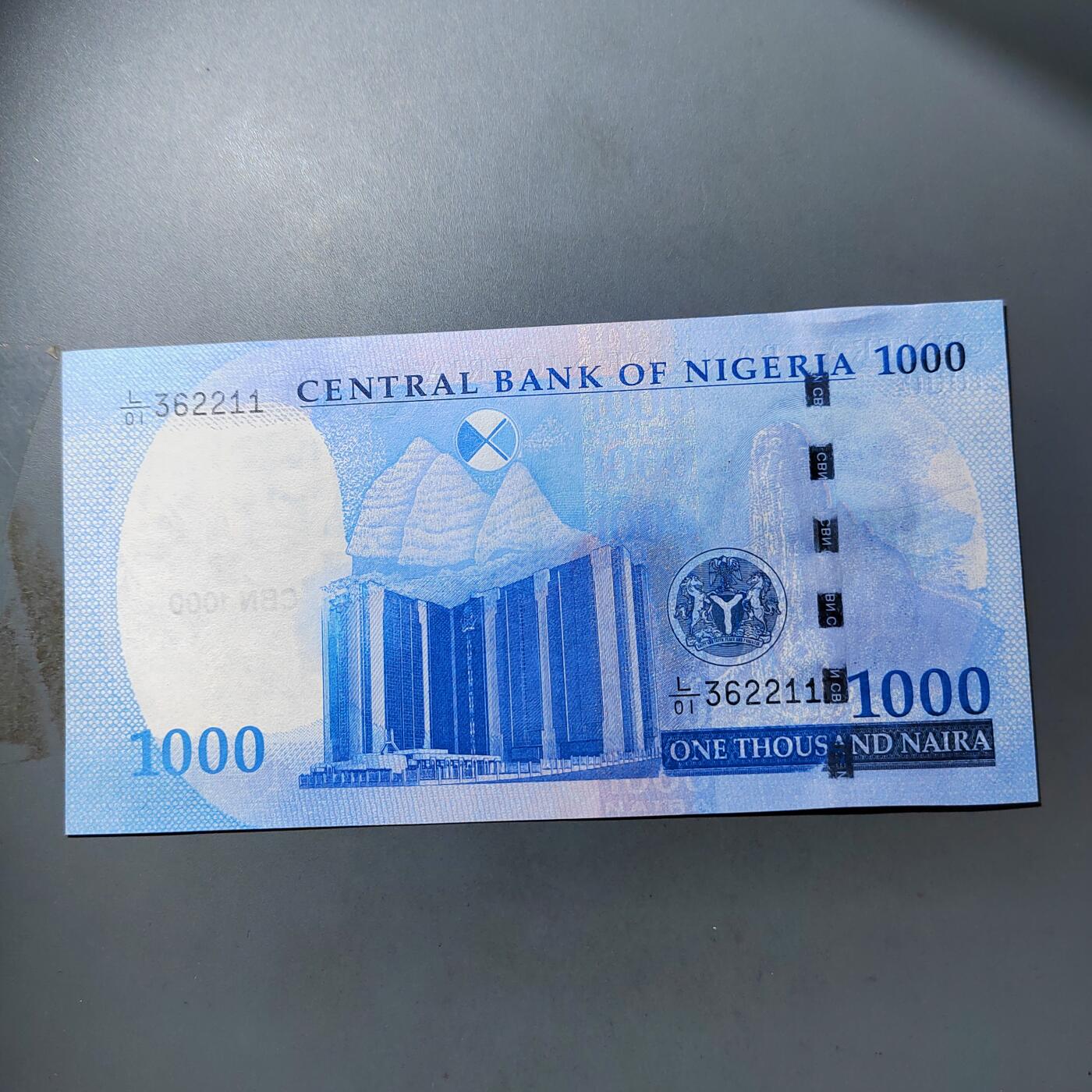 PCAI钱币  12-775  邮票钱币证章小专场 外币壹仟