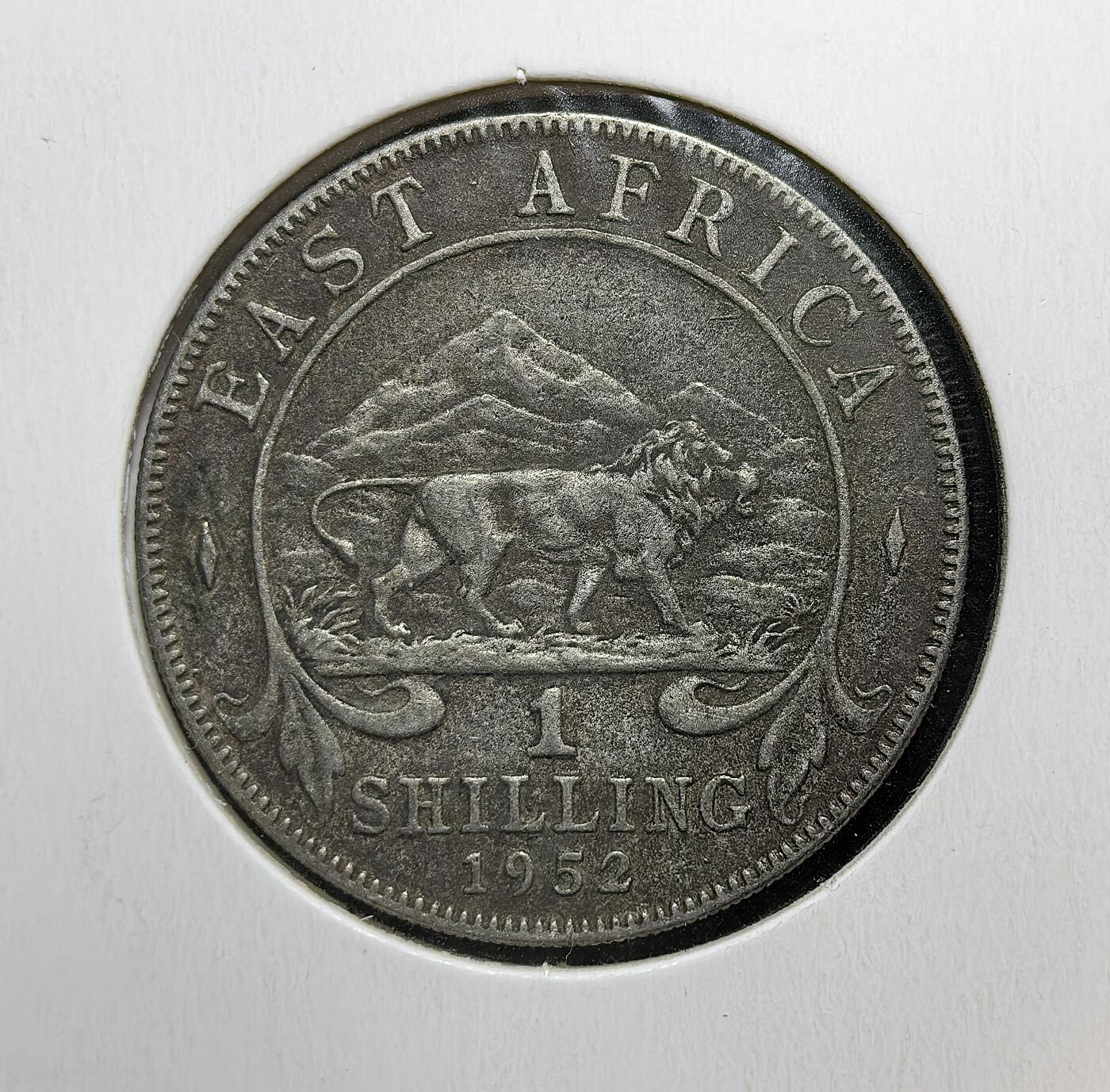 外国优质老铜币银币苏联纪念章，每周六晚九点倒数截拍，满百包邮可寄存，持续收拍 英属东非1952年1先令，正面为乔治六世头像，背面是象征非洲的狮子图案，见证英国殖民统治下东非的统一货币体系与殖民经济背景。