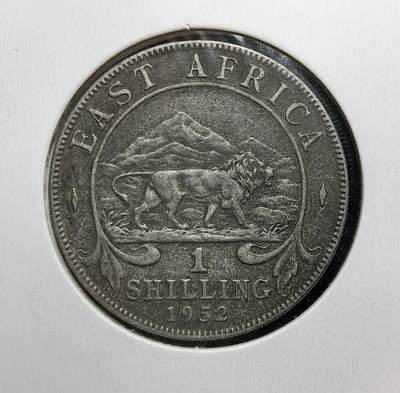 外国优质老铜币银币苏联纪念章，每周六晚九点倒数截拍，满百包邮可寄存，持续收拍 - 英属东非1952年1先令，正面为乔治六世头像，背面是象征非洲的狮子图案，见证英国殖民统治下东非的统一货币体系与殖民经济背景。