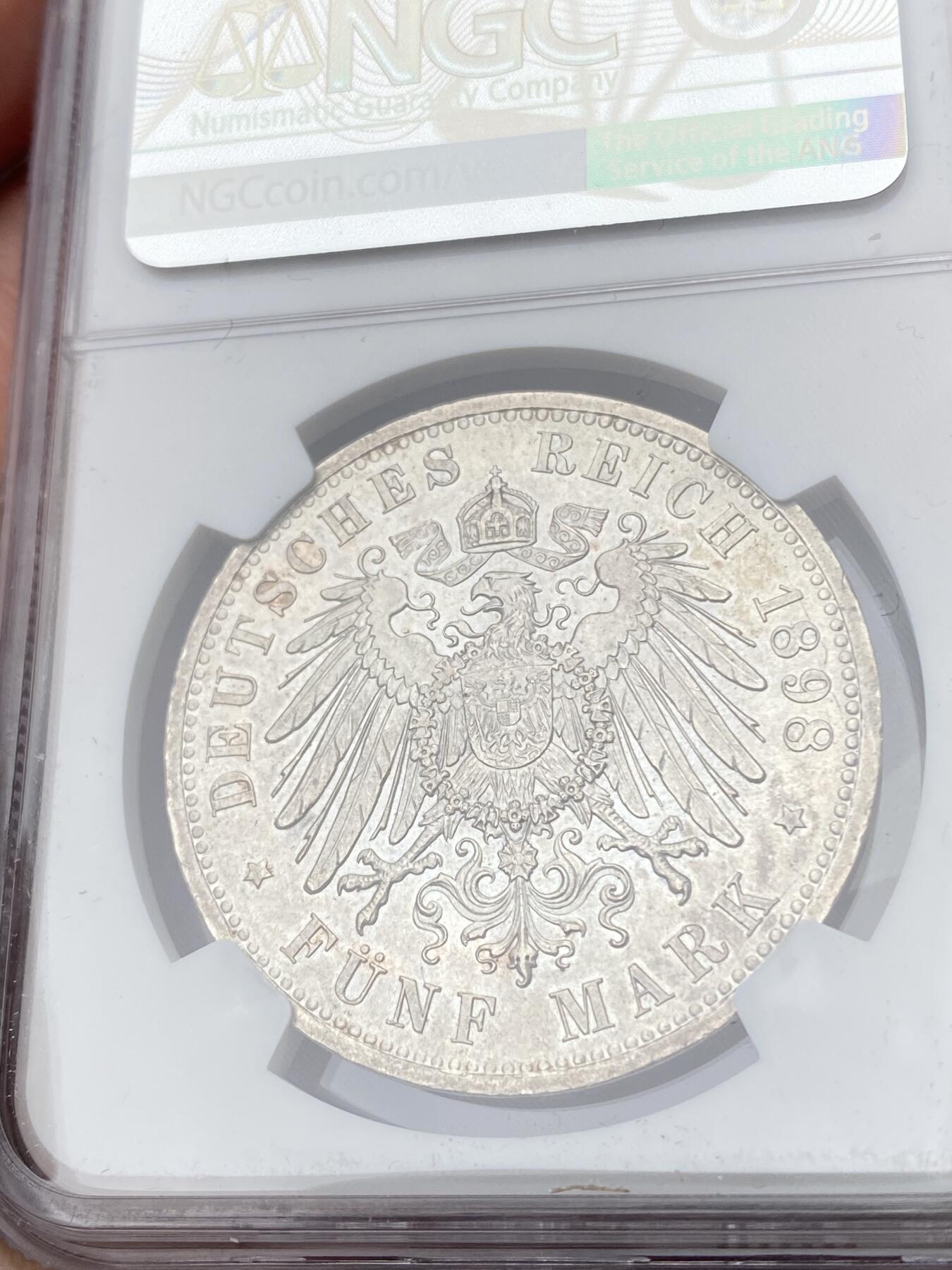 万国钱币拍卖第062期 NGC MS62 1898年德国普鲁士威廉二世长翅流通5马克 流通异常充分的马克品种 罕见早期高难度年份已是NGC季军分 原味青花色调优雅转光收藏级
