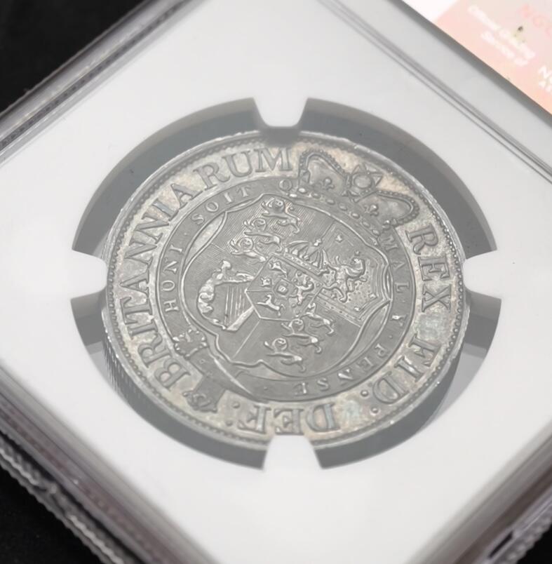 甄臻铺-世界币章拍卖（第54期），3月28日甄品场拍品征集中，送拍享返佣金等优惠多多 NGC-MS62 大英帝国1817年乔治三世牛头半克朗，黑五彩！实物上手令人惊艳的包浆。