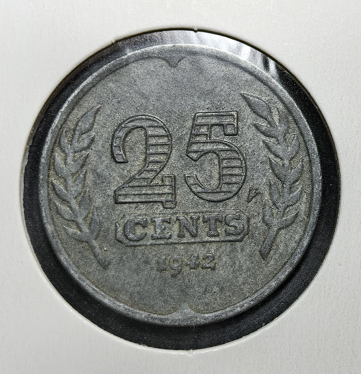 外国优质老铜币银币苏联纪念章，每周六晚九点倒数截拍，满百包邮可寄存，持续收拍 德占荷兰1942年25分。为战时金属管制，以锌代银铸造，正面为维京船，背面是面值与橄榄枝。它见证了纳粹占领下荷兰的经济与社会历史，极具收藏价值。