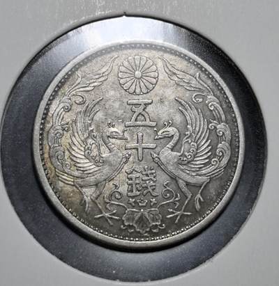 外国优质老铜币银币苏联纪念章，每周六晚九点倒数截拍，满百包邮可寄存，持续收拍 - 日本昭和六年（1931 年）双凤五十钱银币，属于大正至昭和初期流通的银辅币。正面旭日樱花，背面双凤纹，发行于日本放弃金本位、逐步走向战时体制的过渡阶段，1953 年随辅币废止而退出流通