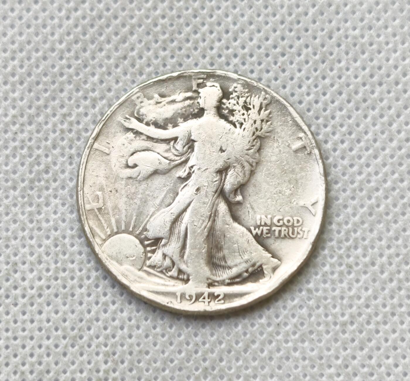 甄臻铺-世界币章拍卖（第54期），3月28日甄品场拍品征集中，送拍享返佣金等优惠多多 美国1942年行走女神半圆银币重12.1g 含银90%