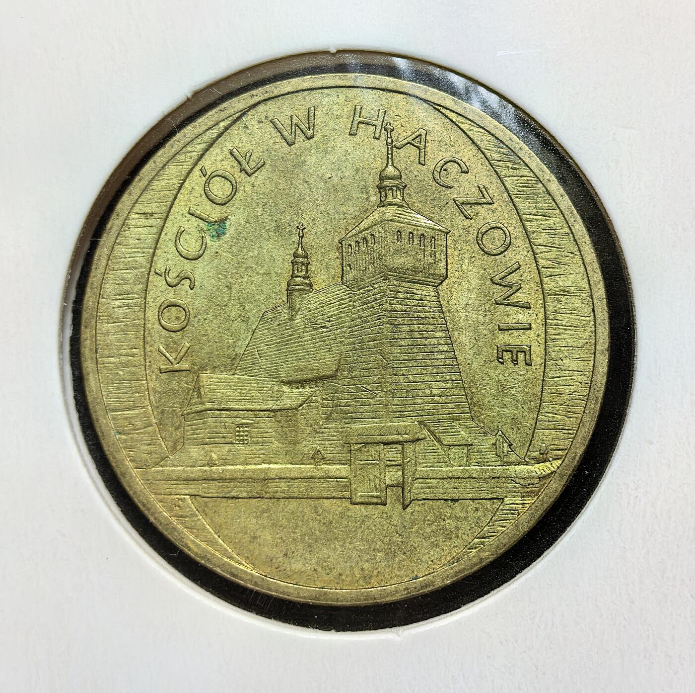 外国优质老铜币银币苏联纪念章，每周六晚九点倒数截拍，满百包邮可寄存，持续收拍 波兰2006年2兹罗提纪念币，属 “波兰历史名城” 系列。正面为波兰国徽白鹰，背面是哈乔维木制教堂，它是世界文化遗产，见证波兰传统木构建筑与宗教文化的传承。