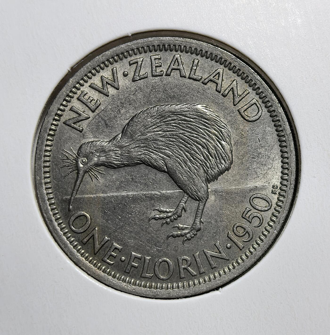 外国优质老铜币银币苏联纪念章，每周六晚九点倒数截拍，满百包邮可寄存，持续收拍 新西兰乔治六世1950年1佛罗林，属英联邦时期流通币，正面为国王侧像，背面是国鸟几维鸟，是新西兰战后经济复苏期的货币见证，极具地域特色与收藏价值。