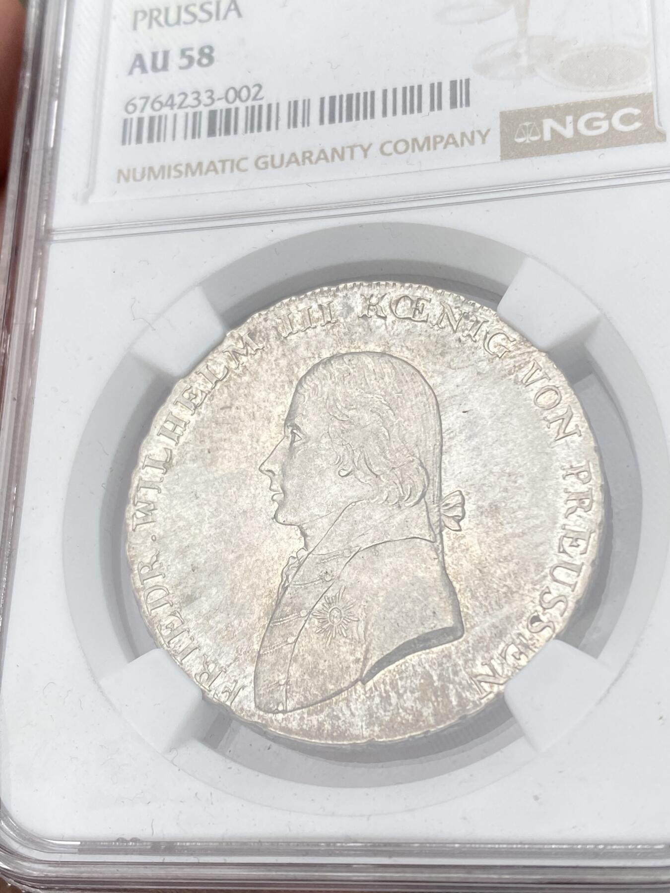 万国钱币拍卖第062期 NGC AU58 1802年德国普鲁士威廉三世野人扶盾泰勒 名誉品种原味欧陆淡彩 工艺受限好品难度不小