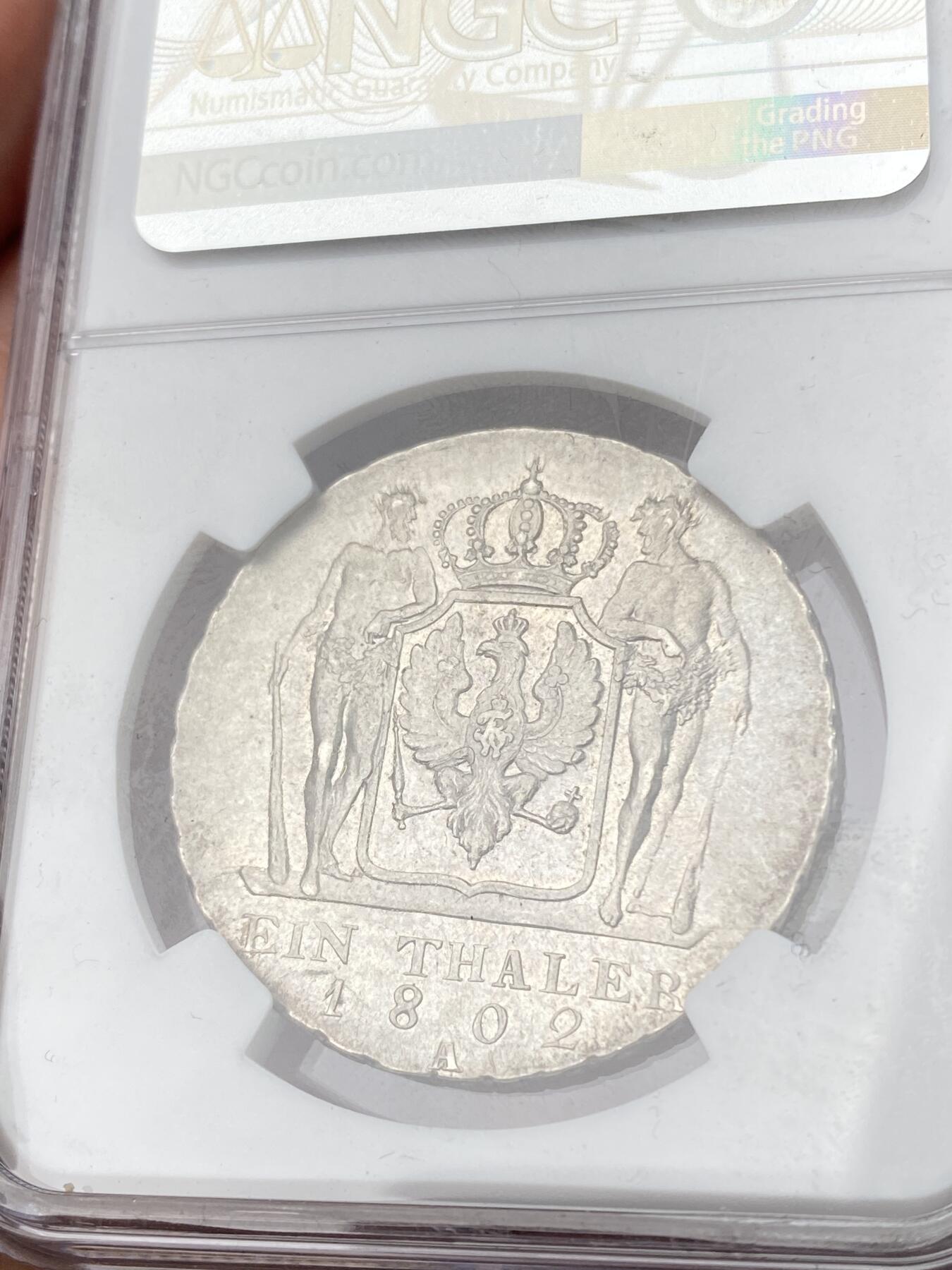 万国钱币拍卖第062期 NGC AU58 1802年德国普鲁士威廉三世野人扶盾泰勒 名誉品种原味欧陆淡彩 工艺受限好品难度不小