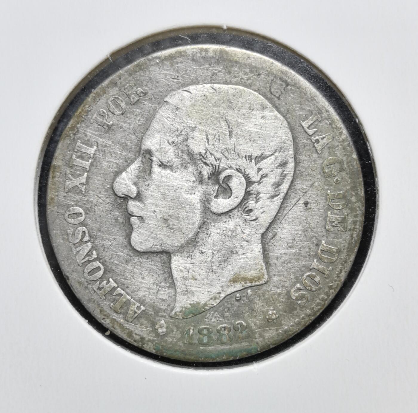 外国优质老铜币银币苏联纪念章，每周六晚九点倒数截拍，满百包邮可寄存，持续收拍 西班牙阿方索十二世1882年2比塞塔银币，由马德里造币厂铸造。正面为国王侧面像，背面是西班牙国徽与双柱图案，见证了波旁王朝复辟后的货币统一与近代化进程。