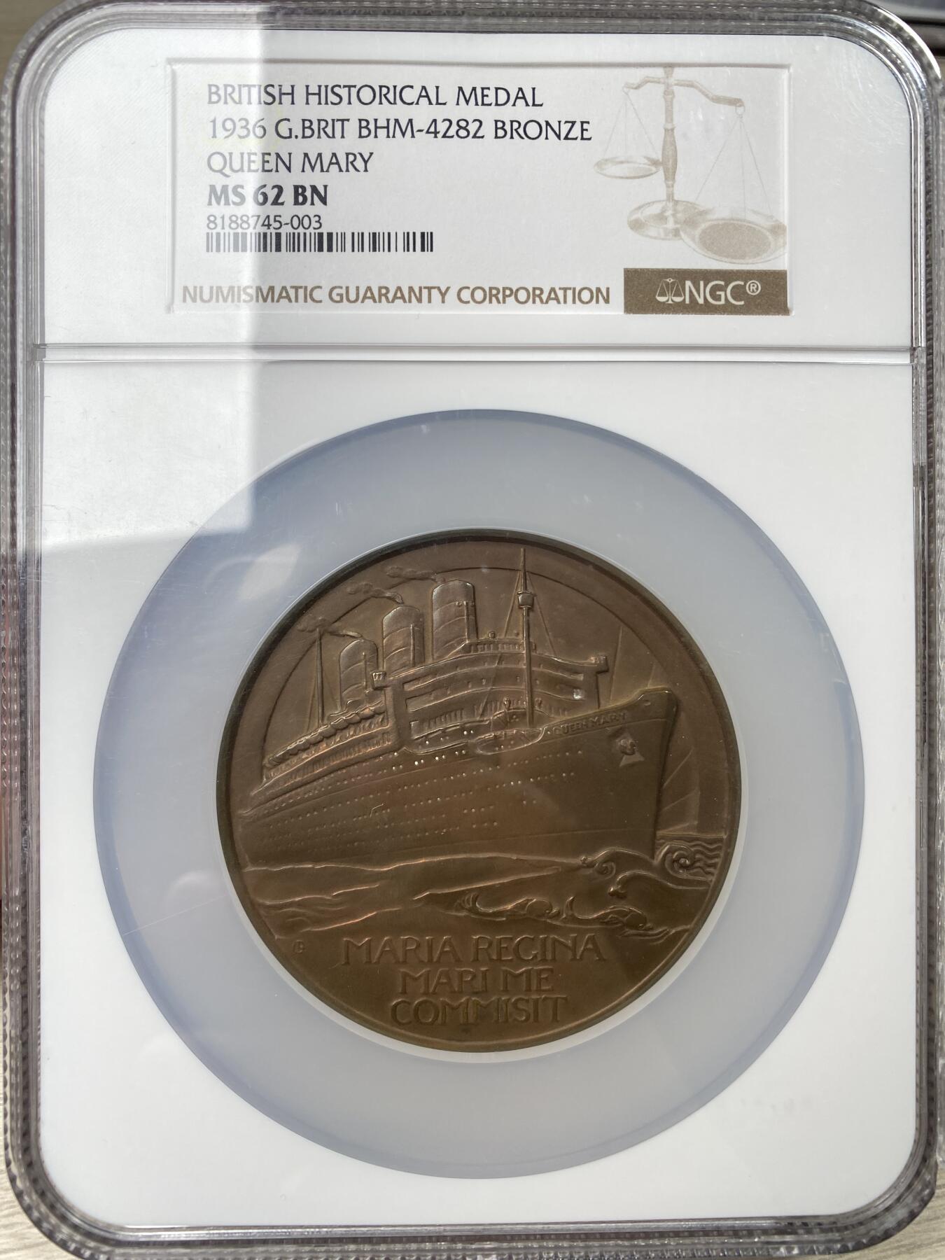 万国钱币拍卖第062期 NGC MS62 1936年英国玛丽女王号首航纪念铜章 由英国皇家造币厂新雕塑运动的领军人物吉尔伯特·贝叶斯出品 直径70毫米 重171克 目录编号BHM-4282 NGC盒子边缘有磕碰