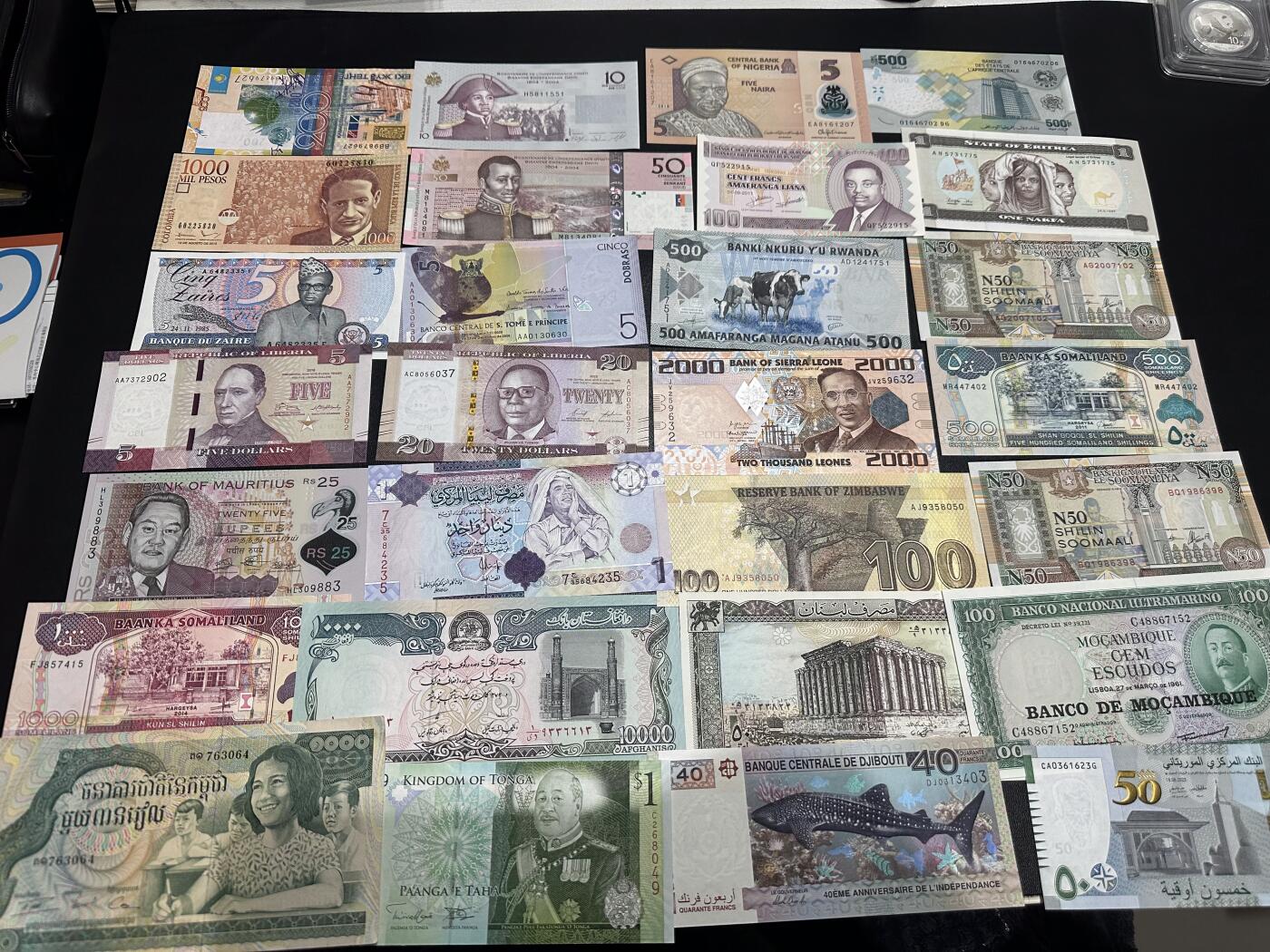 《外钞收藏家》第六百一十七期（精选场）（长期征集拍品、欢迎藏友们联系合作） 哈萨克斯坦、毛里求斯、利比里亚、吉布提、毛里塔尼亚28张一起 有2张非全新 其他全新