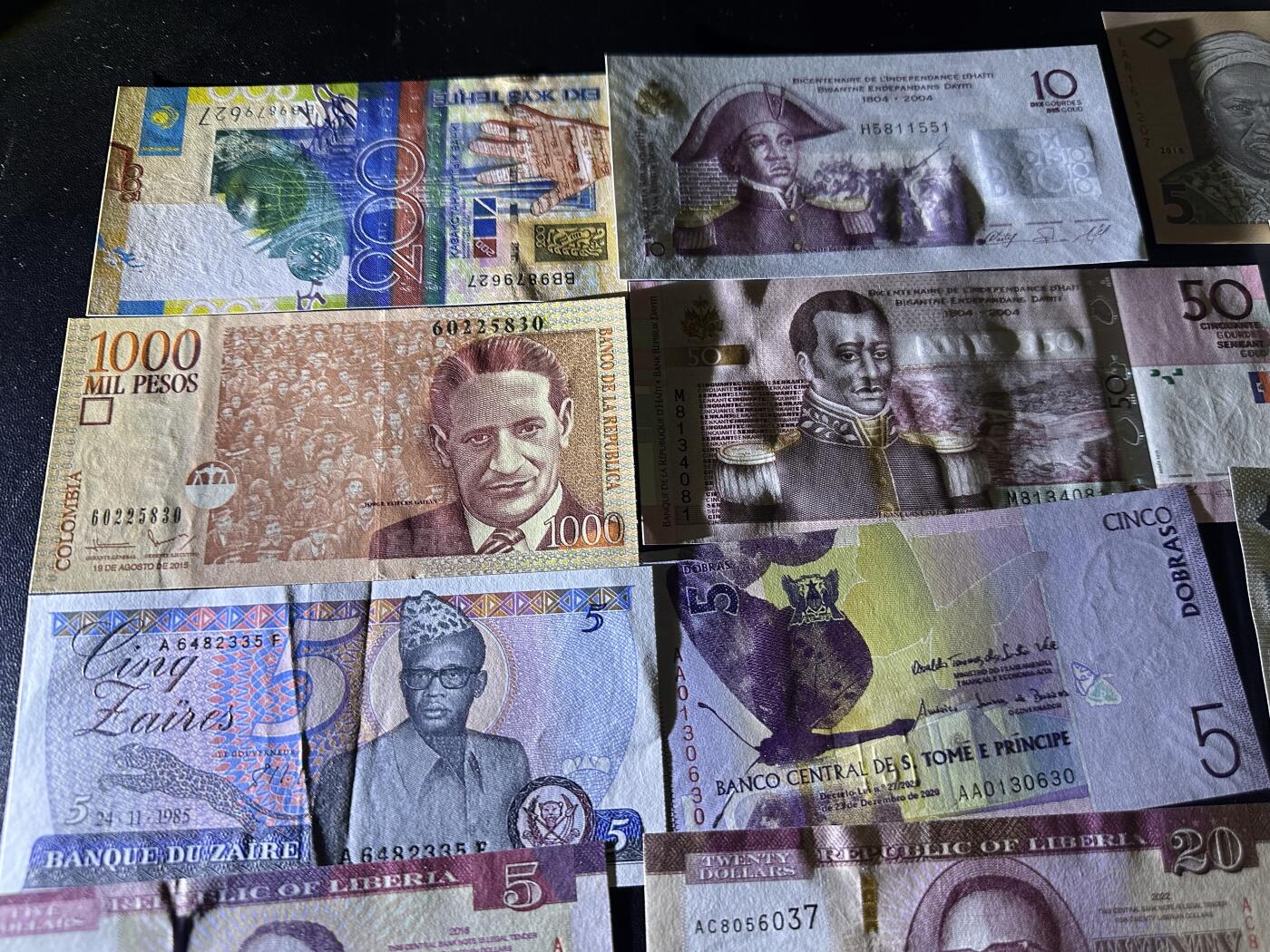 《外钞收藏家》第六百一十七期（精选场）（长期征集拍品、欢迎藏友们联系合作） 哈萨克斯坦、毛里求斯、利比里亚、吉布提、毛里塔尼亚28张一起 有2张非全新 其他全新