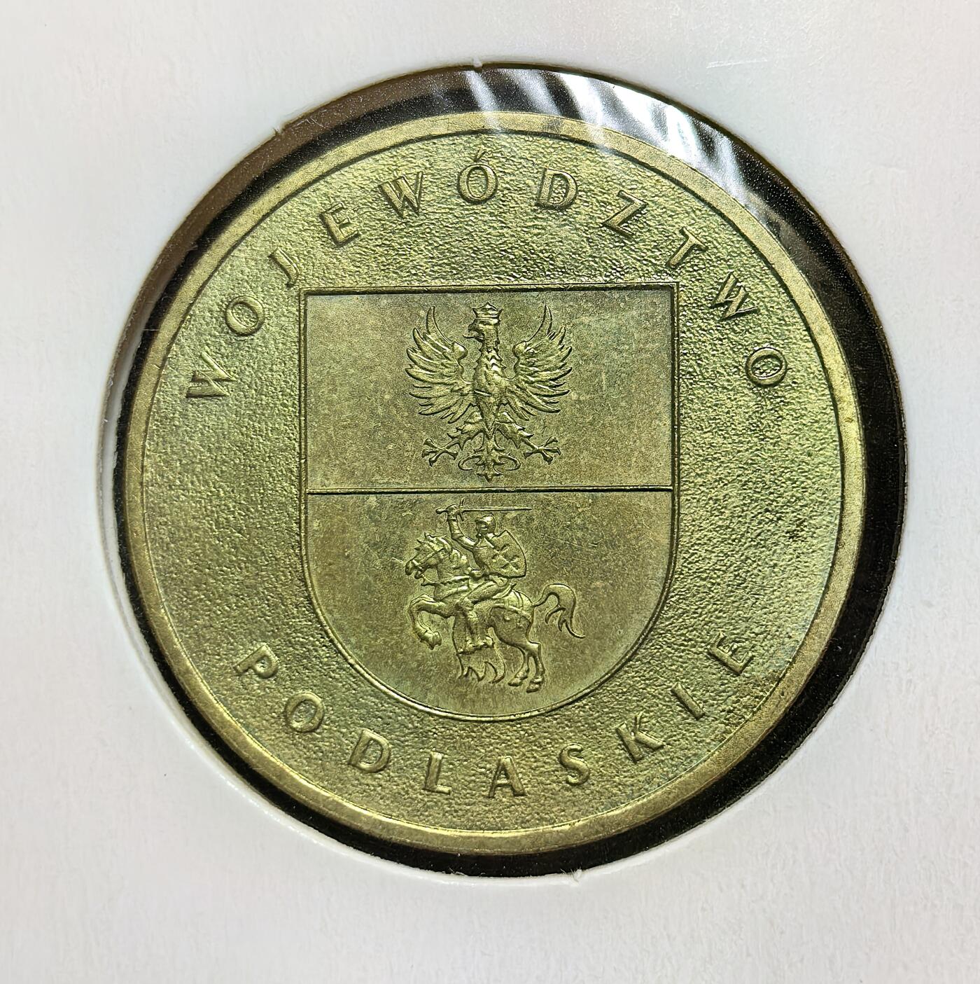 外国优质老铜币银币苏联纪念章，每周六晚九点倒数截拍，满百包邮可寄存，持续收拍 波兰2004年2兹罗提纪念币，正面为波兰国徽白鹰与地图轮廓，背面为波德拉谢省省徽（白鹰与骑士），纪念该地区历史文化与国家认同，是波兰行政区划系列的重要藏品。