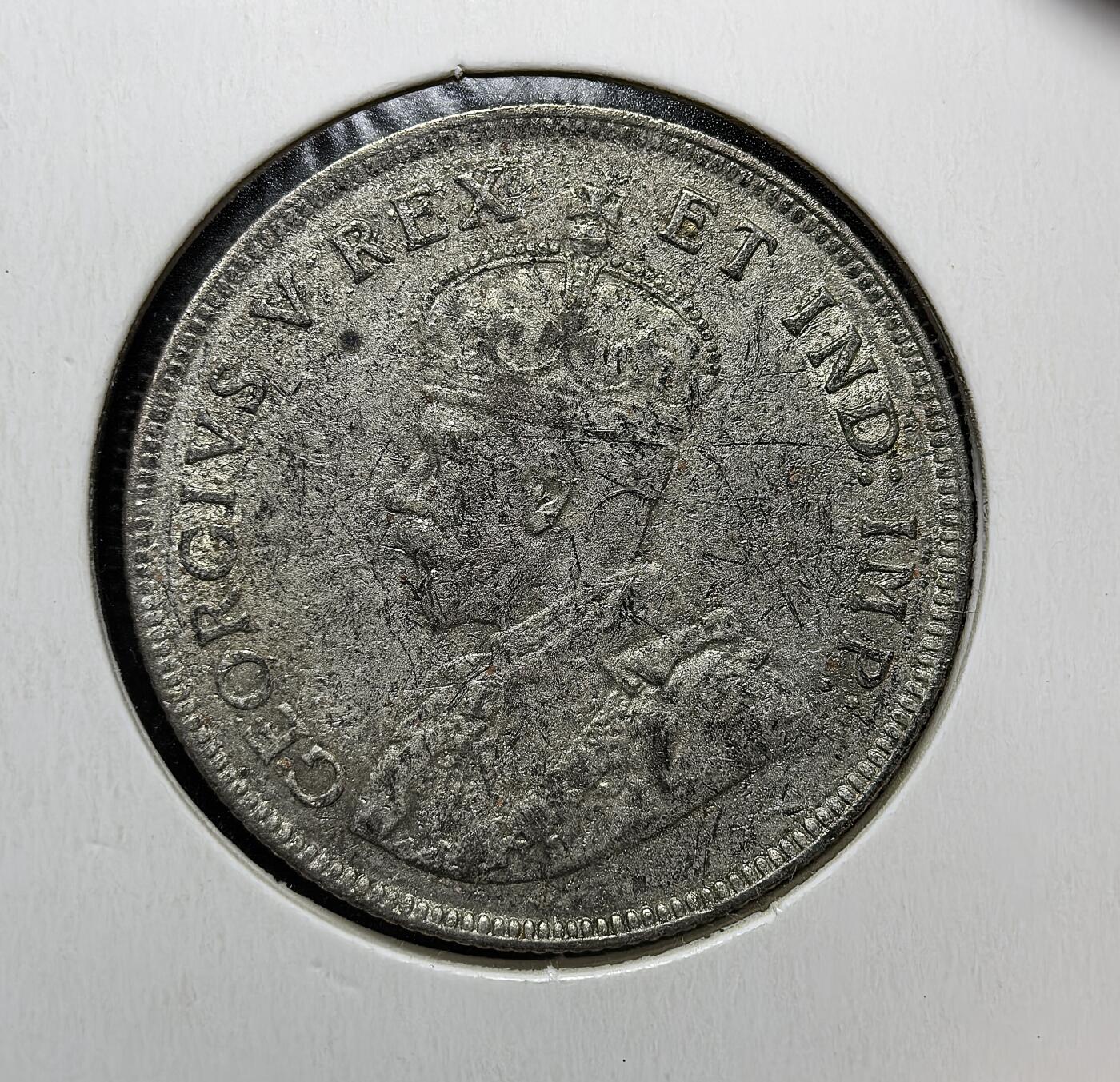 外国优质老铜币银币苏联纪念章，每周六晚九点倒数截拍，满百包邮可寄存，持续收拍 英属东非1924年1先令银币，正面为乔治五世头像及 “国王与印度皇帝” 头衔，背面是象征非洲的狮子与乞力马扎罗山，见证英国殖民统治下东非统一货币体系与殖民经济。