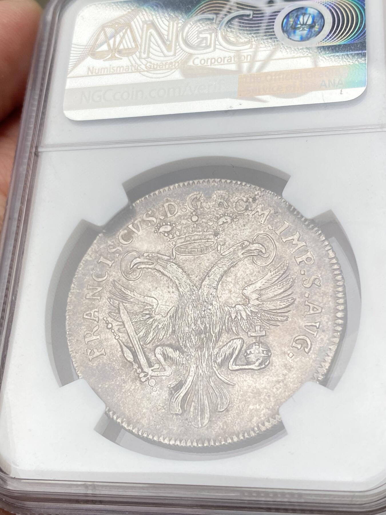 万国钱币拍卖第062期 NGC MS62 1748年德国不莱梅自由市双狮护盾1/2泰勒银币 罕见早期不莱梅双狮护钥 打制极其深峻细节纤毫毕现 淡五彩包浆环绕原味收藏级 NGC唯一冠军分