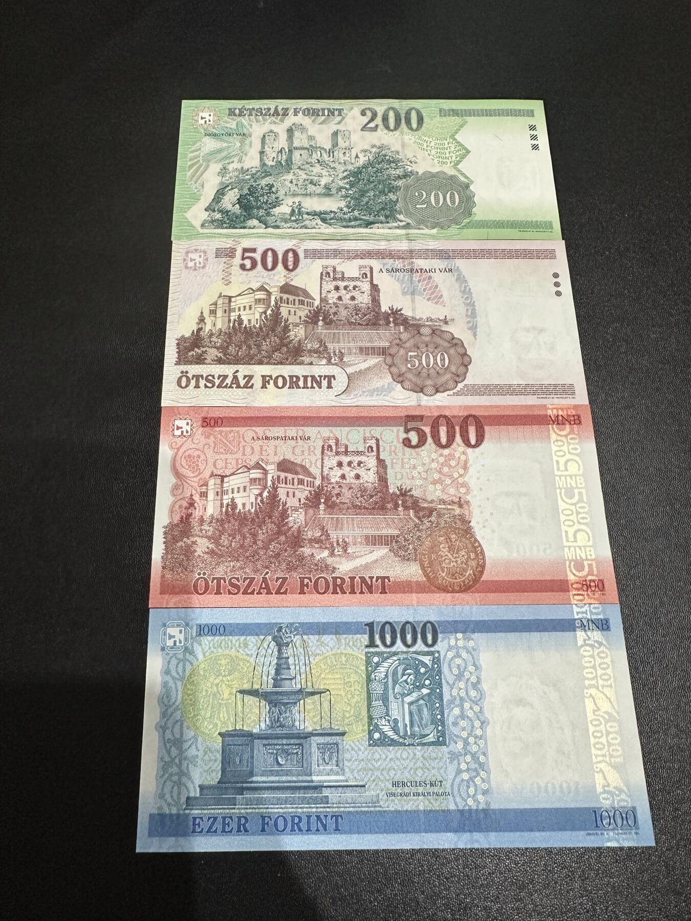 《外钞收藏家》第六百一十七期（精选场）（长期征集拍品、欢迎藏友们联系合作） 匈牙利200-1000福林 四张一起 全新UNC