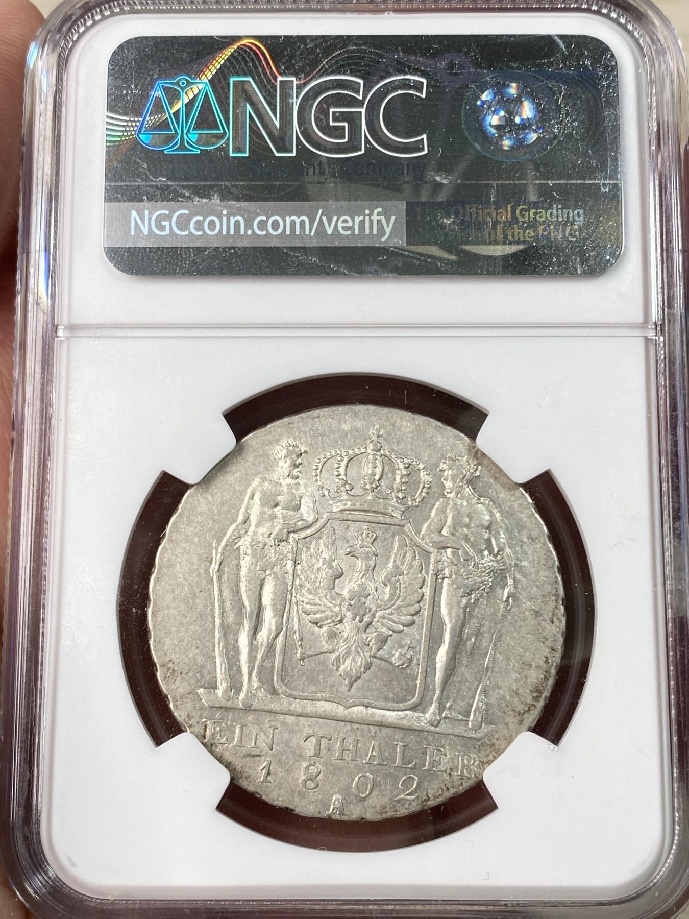 万国钱币拍卖第062期 NGC AU58 1802年德国普鲁士威廉三世野人扶盾泰勒 名誉品种原味欧陆淡彩 工艺受限好品难度不小