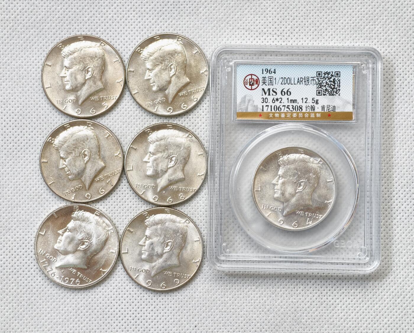 甄臻铺-世界币章拍卖（第54期），3月28日甄品场拍品征集中，送拍享返佣金等优惠多多 美国肯尼迪半圆银币一组7枚，一枚9成银，六枚4成银