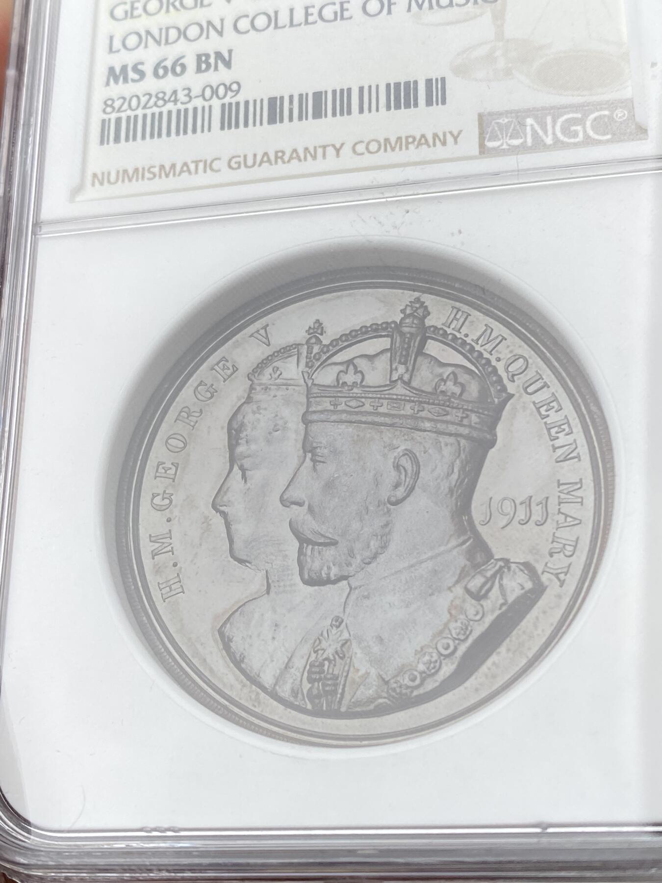 万国钱币拍卖第062期 NGC MS66 1911年英国乔治五世和玛丽皇后加冕典礼大铜章 原味精铸红铜光GEM超级品收藏级