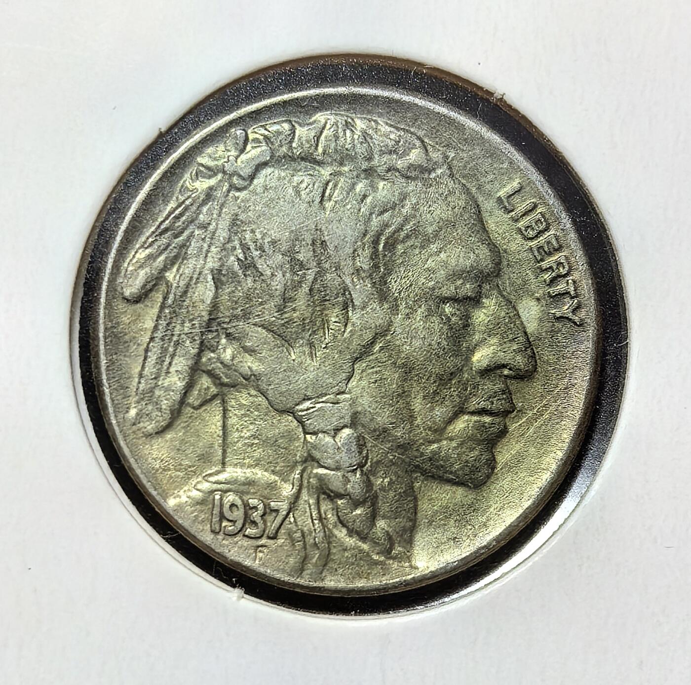 外国优质老铜币银币苏联纪念章，每周六晚九点倒数截拍，满百包邮可寄存，持续收拍 极美品美国1937年野牛5分（印第安人头像）由詹姆斯・厄尔・弗雷泽设计，正面为印第安酋长、背面为美洲野牛，象征西部精神。1937 年是该系列末期，次年被杰斐逊镍币取代，是极具收藏价值的美国经典硬币