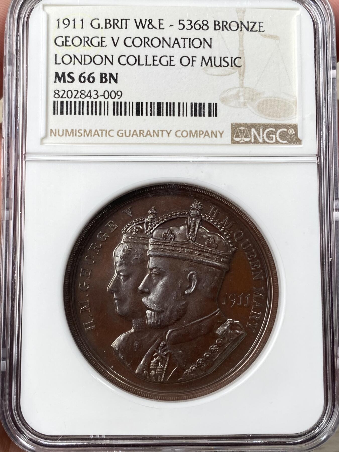 万国钱币拍卖第062期 NGC MS66 1911年英国乔治五世和玛丽皇后加冕典礼大铜章 原味精铸红铜光GEM超级品收藏级