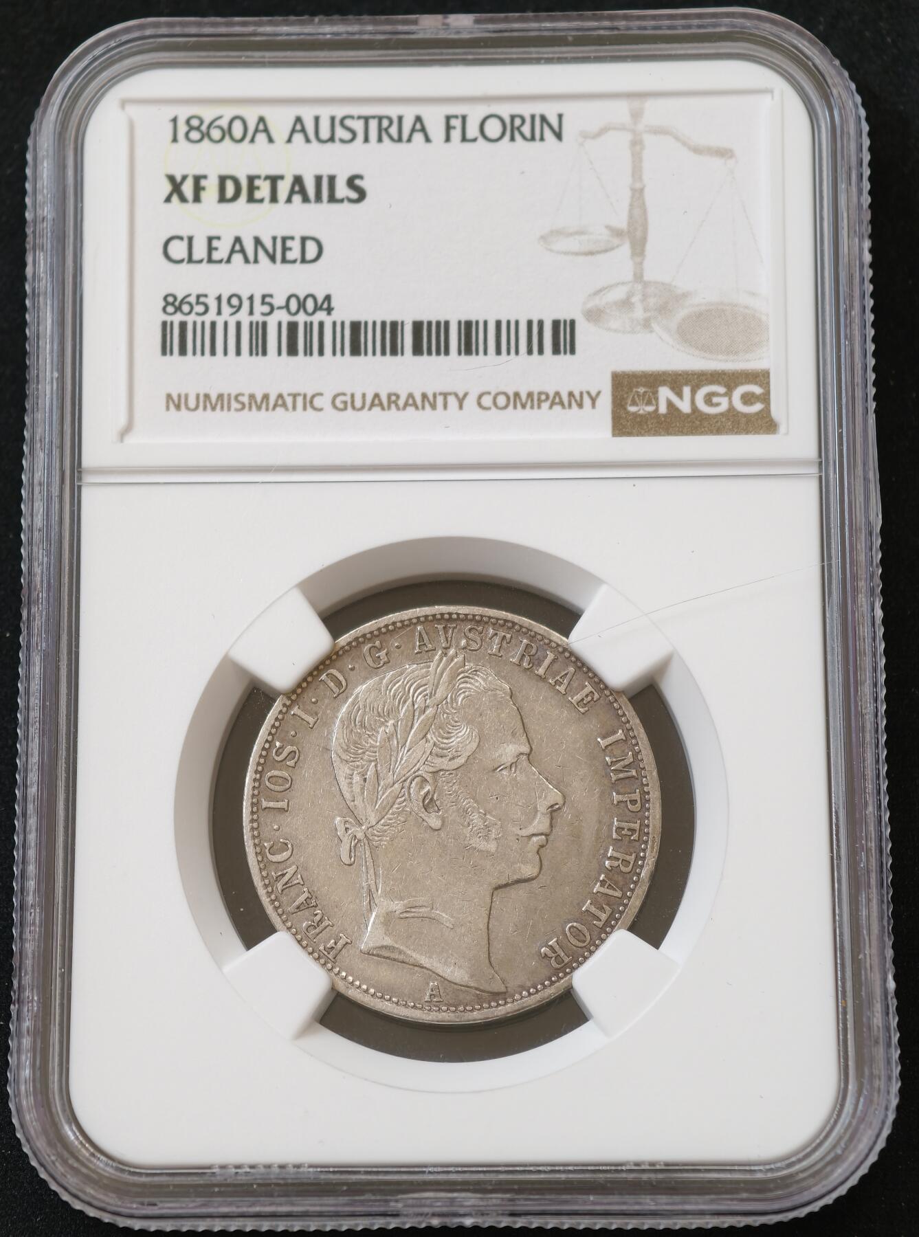 甄臻铺-世界币章拍卖（第54期），3月28日甄品场拍品征集中，送拍享返佣金等优惠多多 NGC-XF 1860年A版青年约瑟夫1福林银币 弗朗茨约瑟夫 一弗洛林 弗朗茨1福林 成色不错 转光明显 细节完好 900银 克重12.3g 相较老年版造量和存世量都少很多