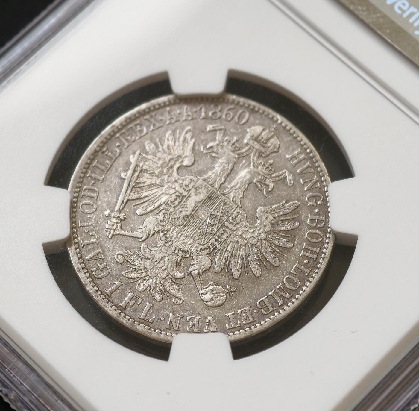 甄臻铺-世界币章拍卖（第54期），3月28日甄品场拍品征集中，送拍享返佣金等优惠多多 NGC-XF 1860年A版青年约瑟夫1福林银币 弗朗茨约瑟夫 一弗洛林 弗朗茨1福林 成色不错 转光明显 细节完好 900银 克重12.3g 相较老年版造量和存世量都少很多