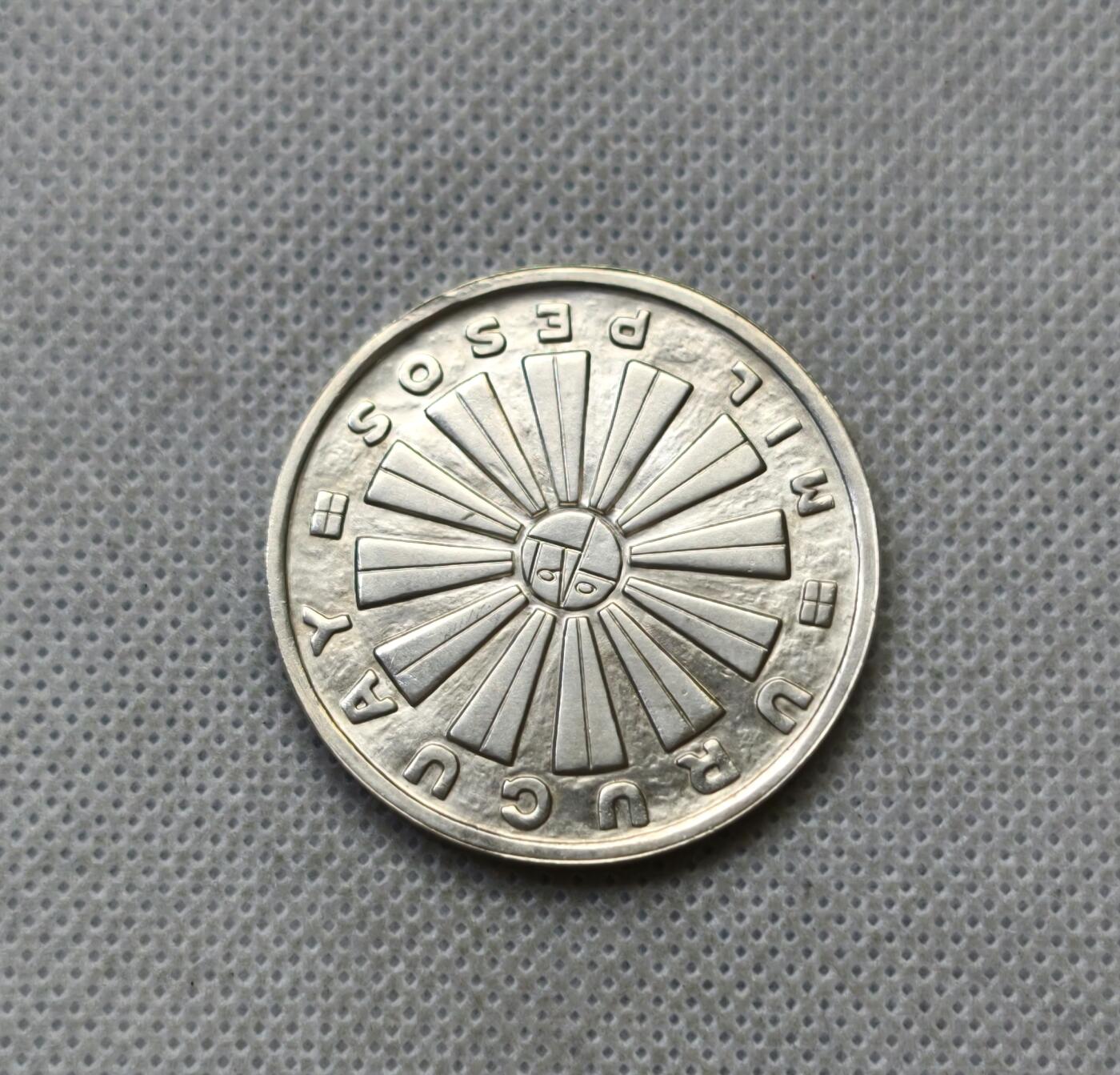 甄臻铺-世界币章拍卖（第54期），3月28日甄品场拍品征集中，送拍享返佣金等优惠多多 乌拉圭1969年联合国粮农1000比索纪念银币重25g 含银90%